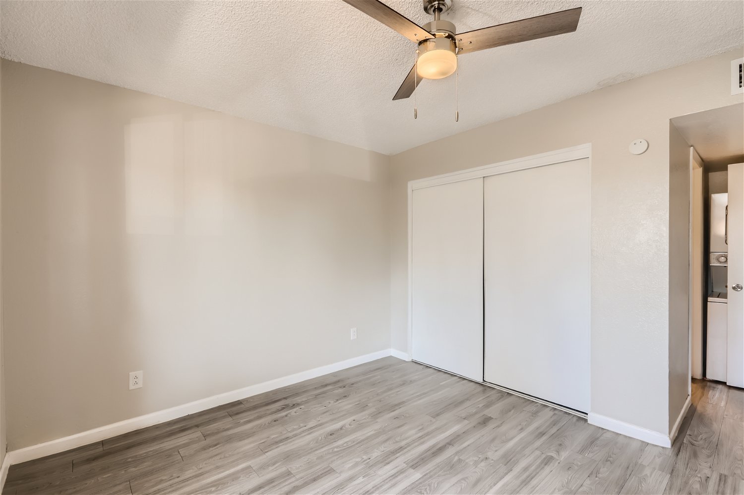 The bedroom at Rise Trailside with a double closet. 