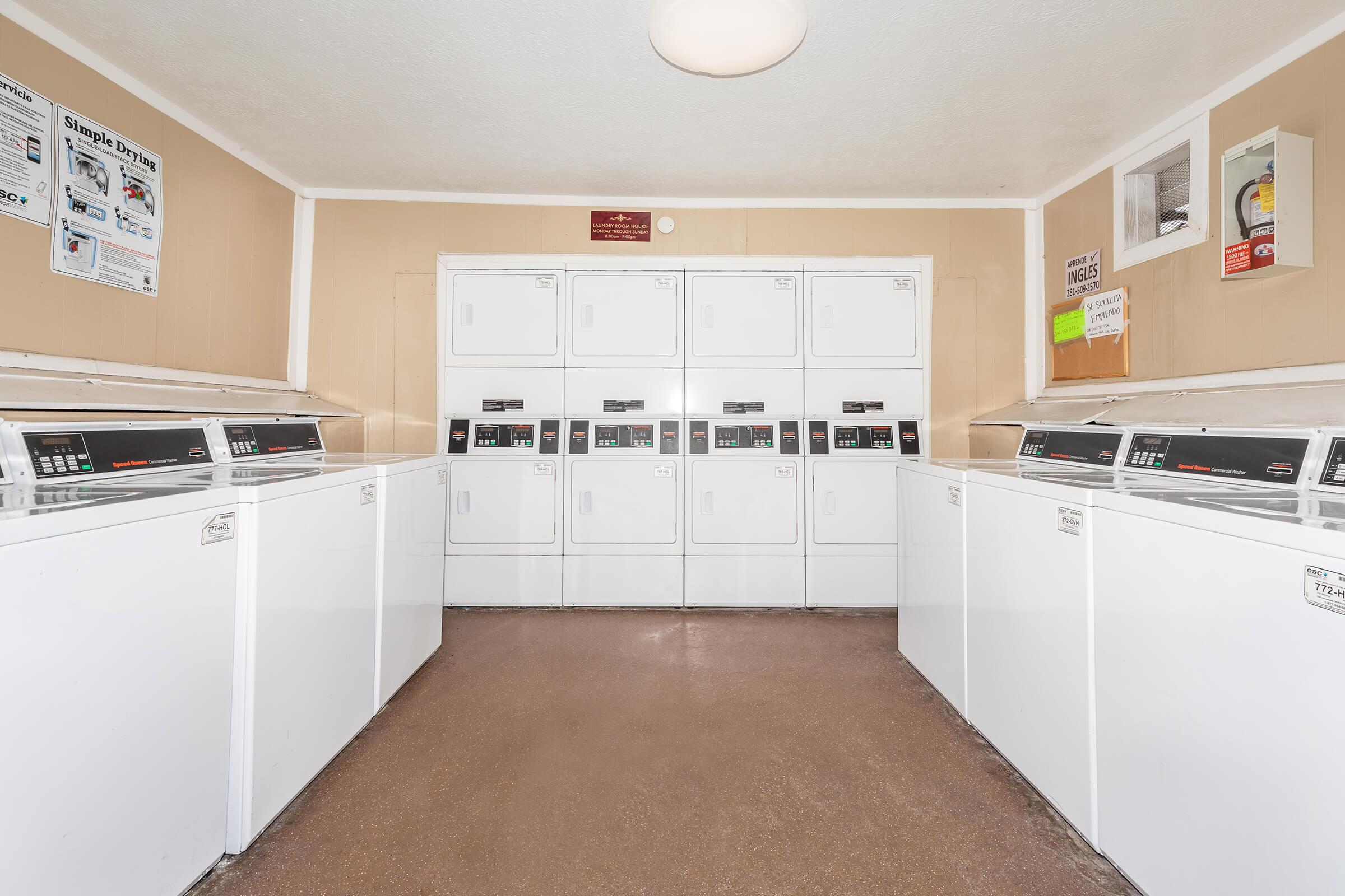 a kitchen with a stove and a refrigerator