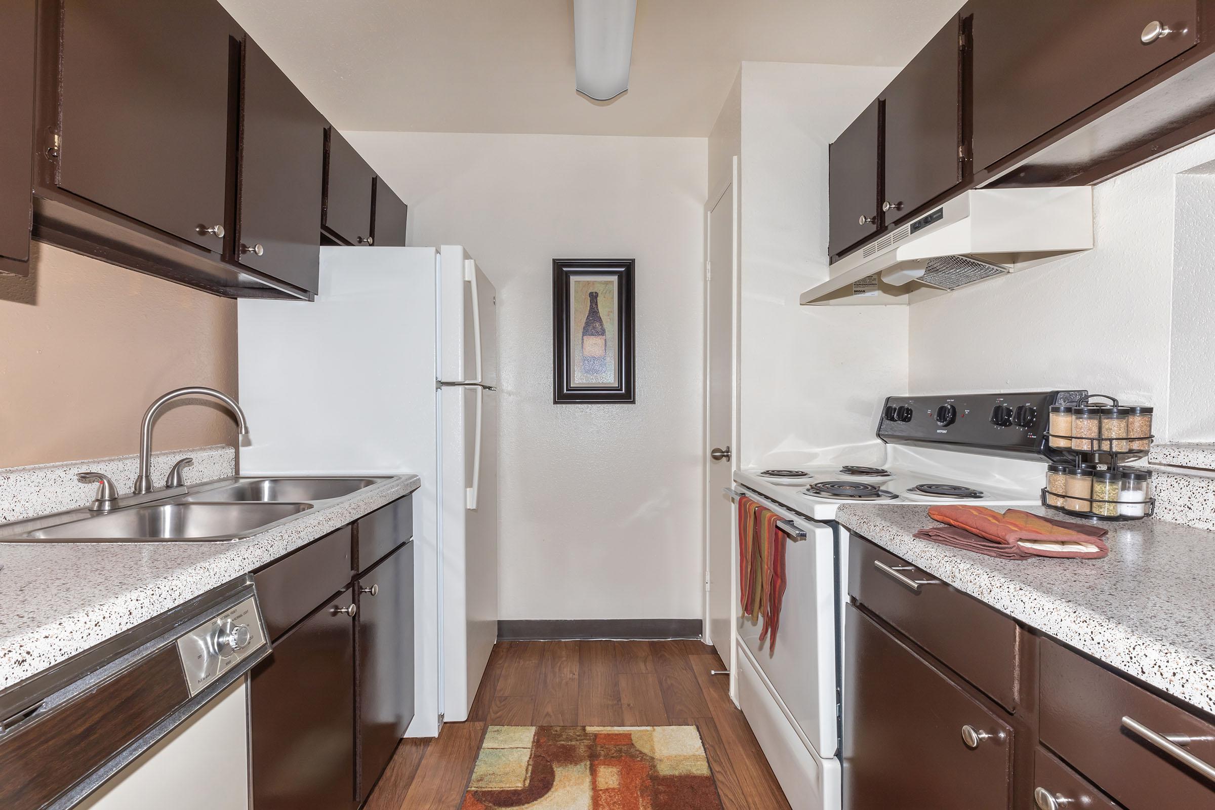 a modern kitchen with stainless steel appliances