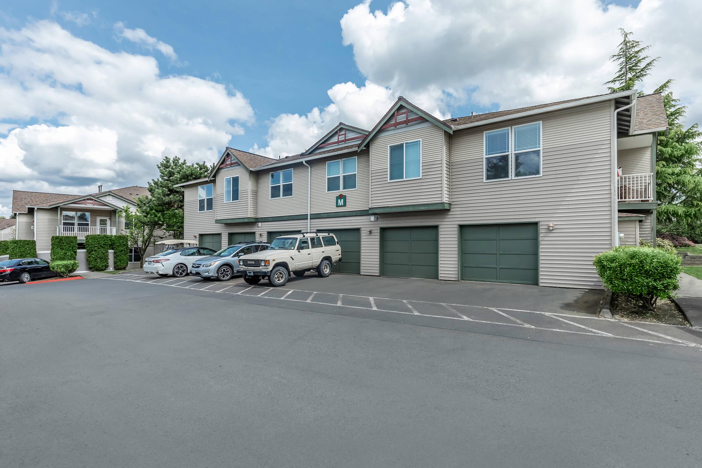 a small house in a parking lot