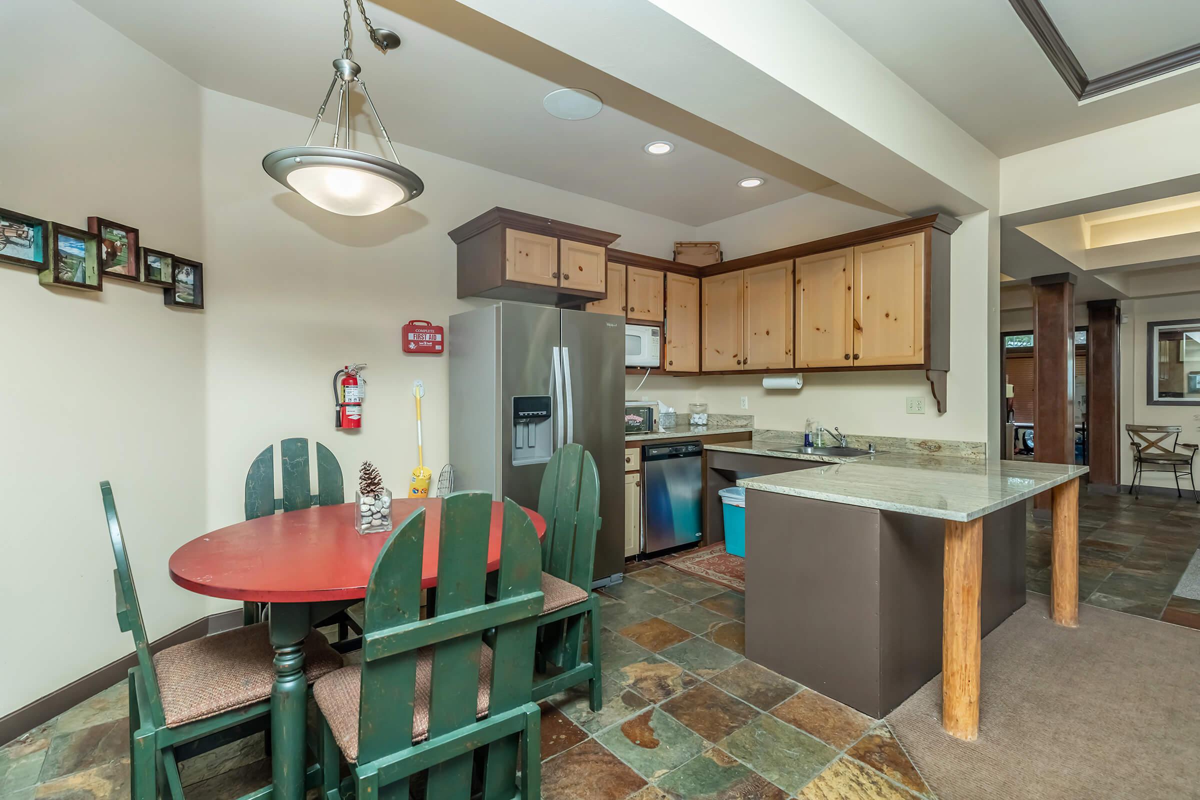 a room filled with furniture and a stove