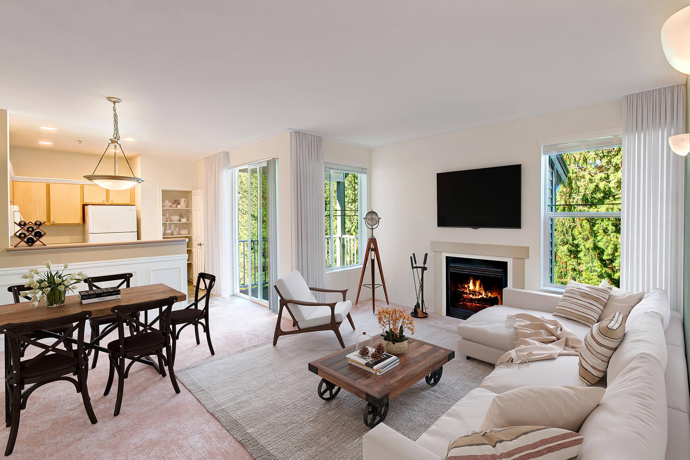 a living room filled with furniture and a fire place