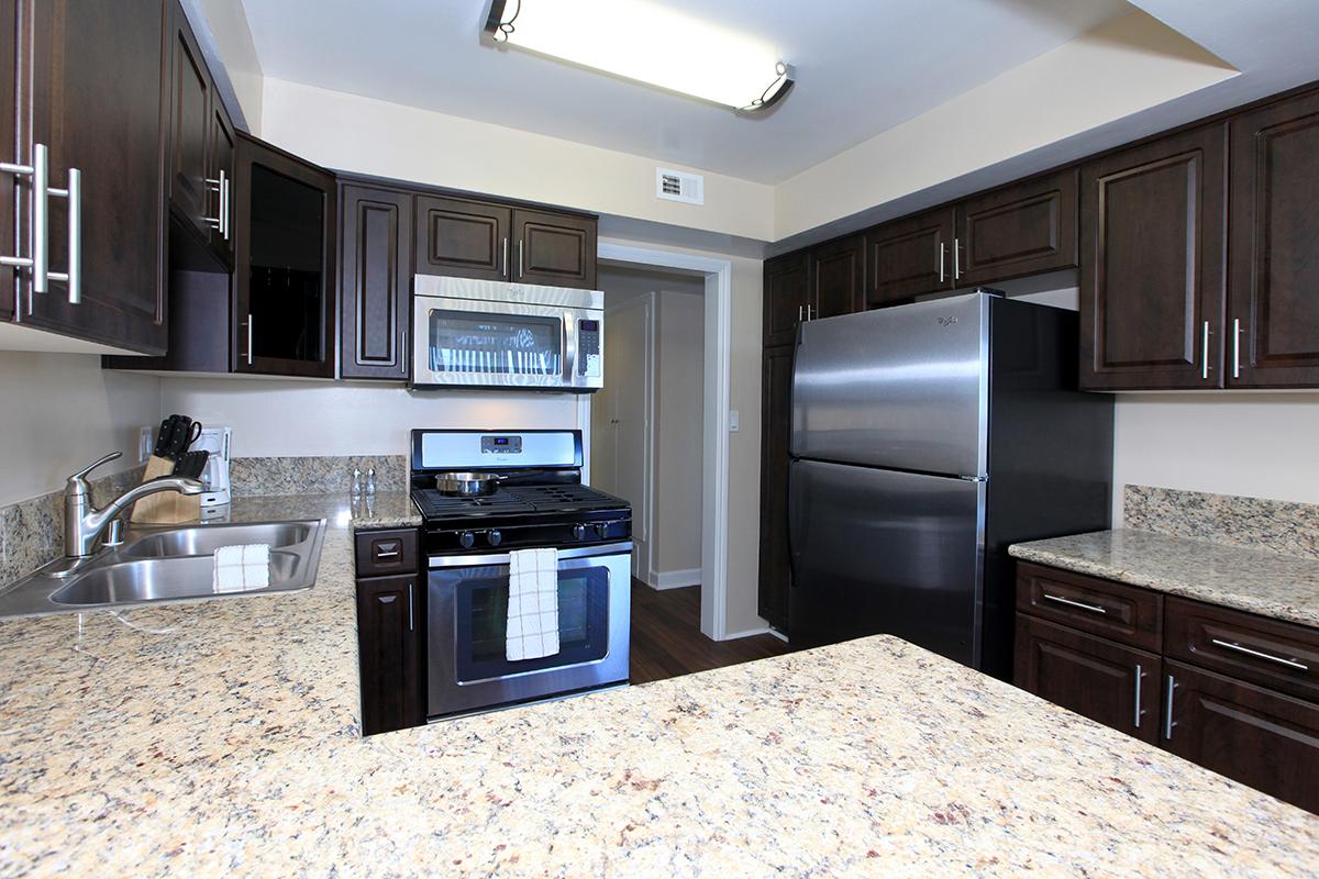 a modern kitchen with stainless steel appliances
