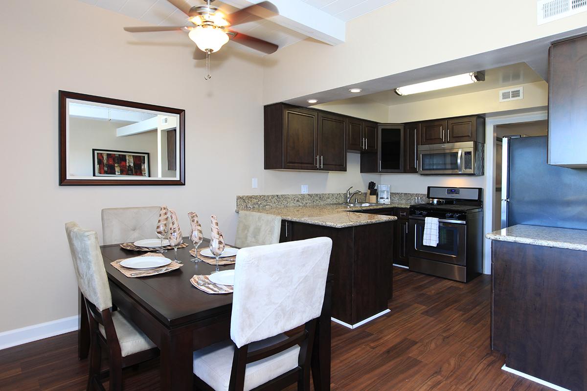 a room filled with furniture and a wood floor