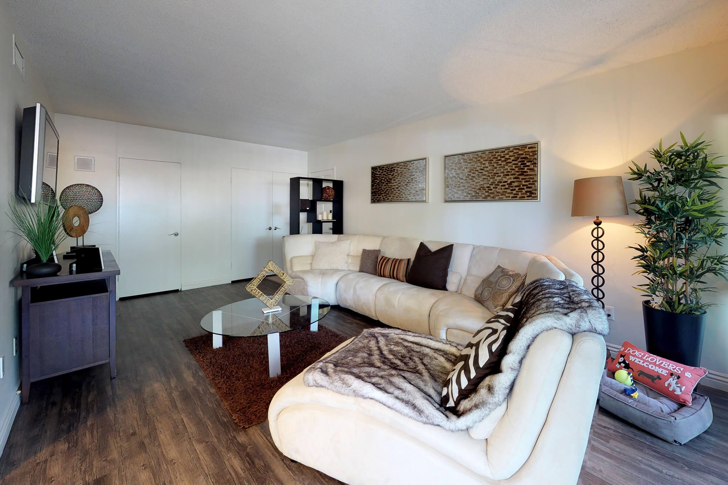 a bedroom with a bed in a room