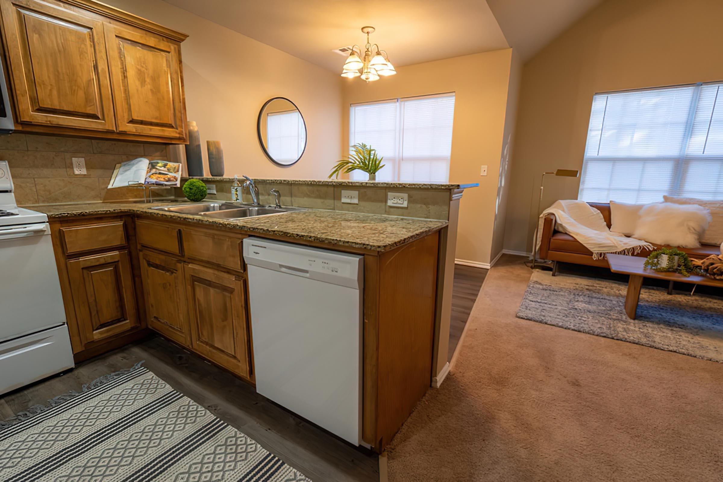 a kitchen with an island in the middle of a room