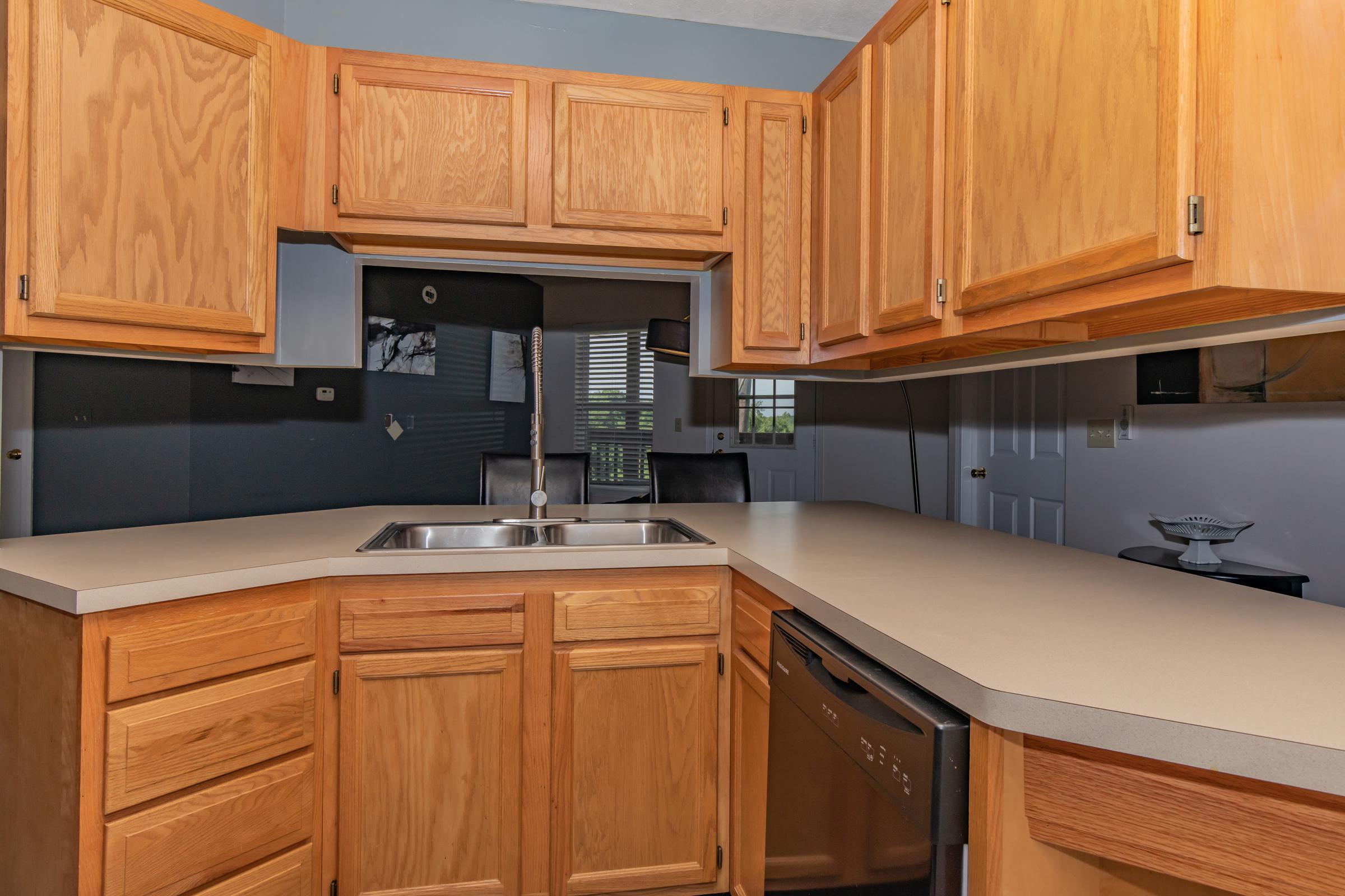 Kitchen cabinetry with sink area