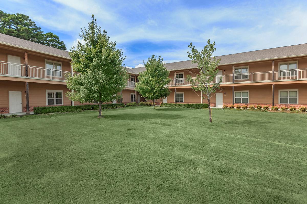 a large lawn in front of a house