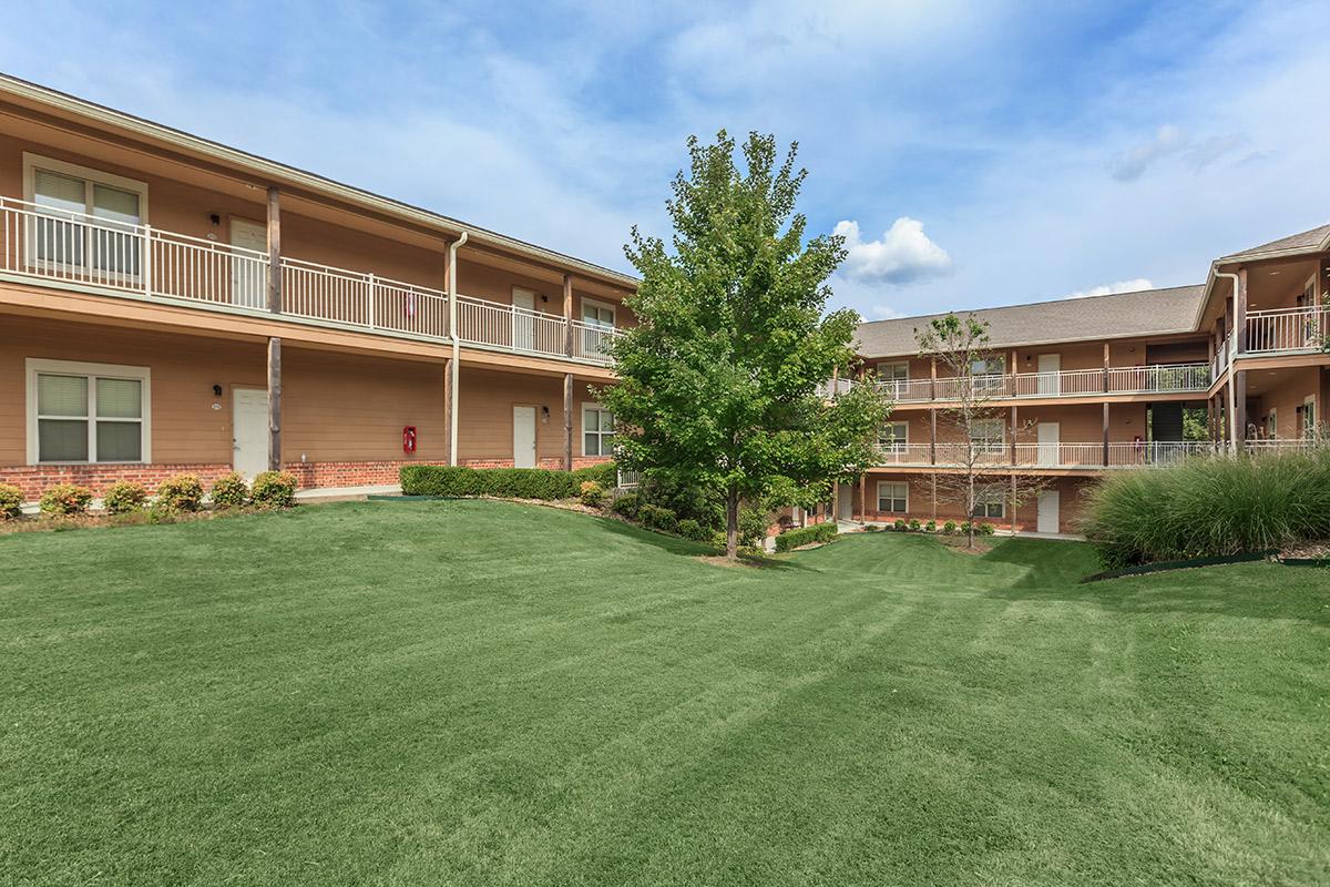 a large lawn in front of a house