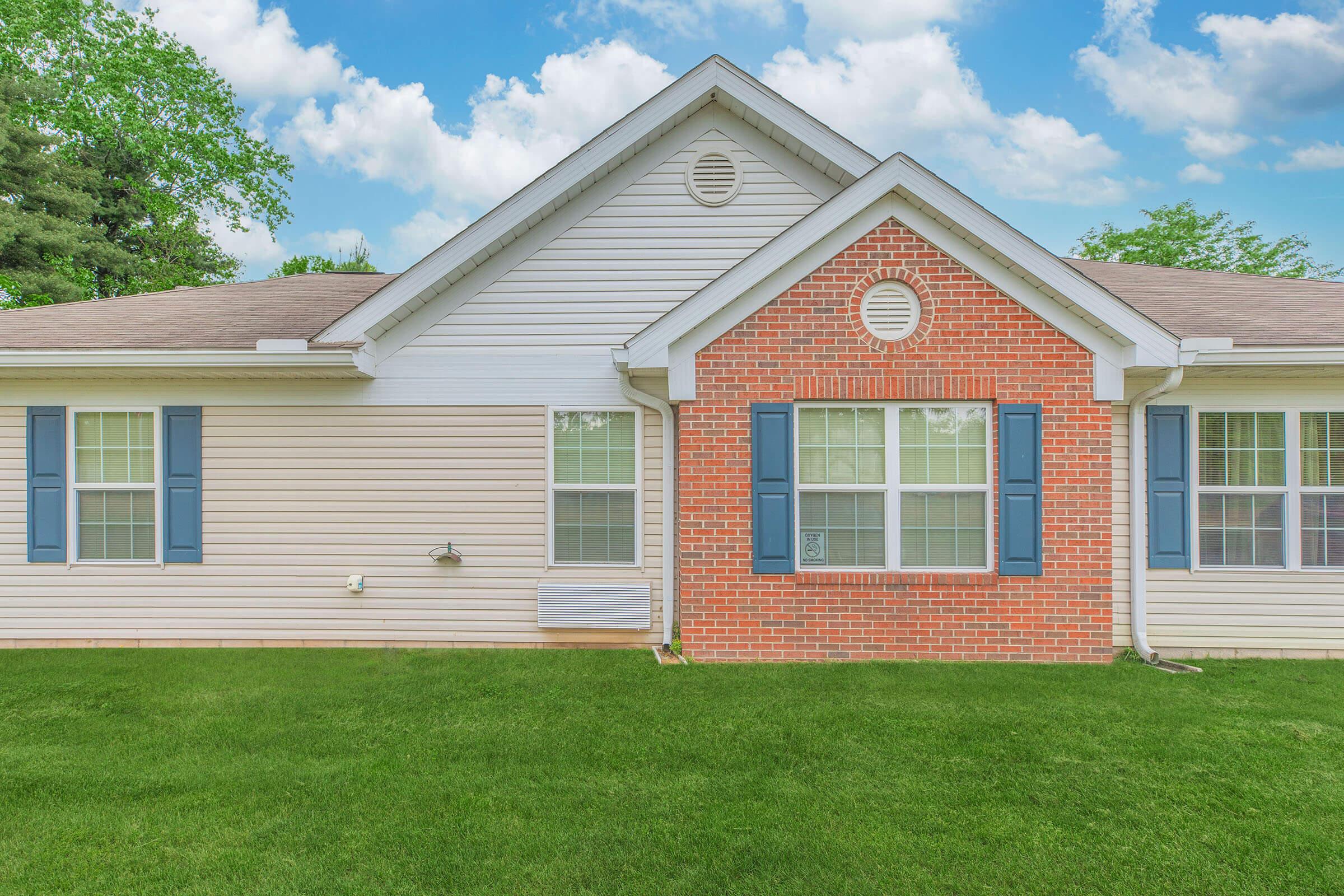 a large lawn in front of a house