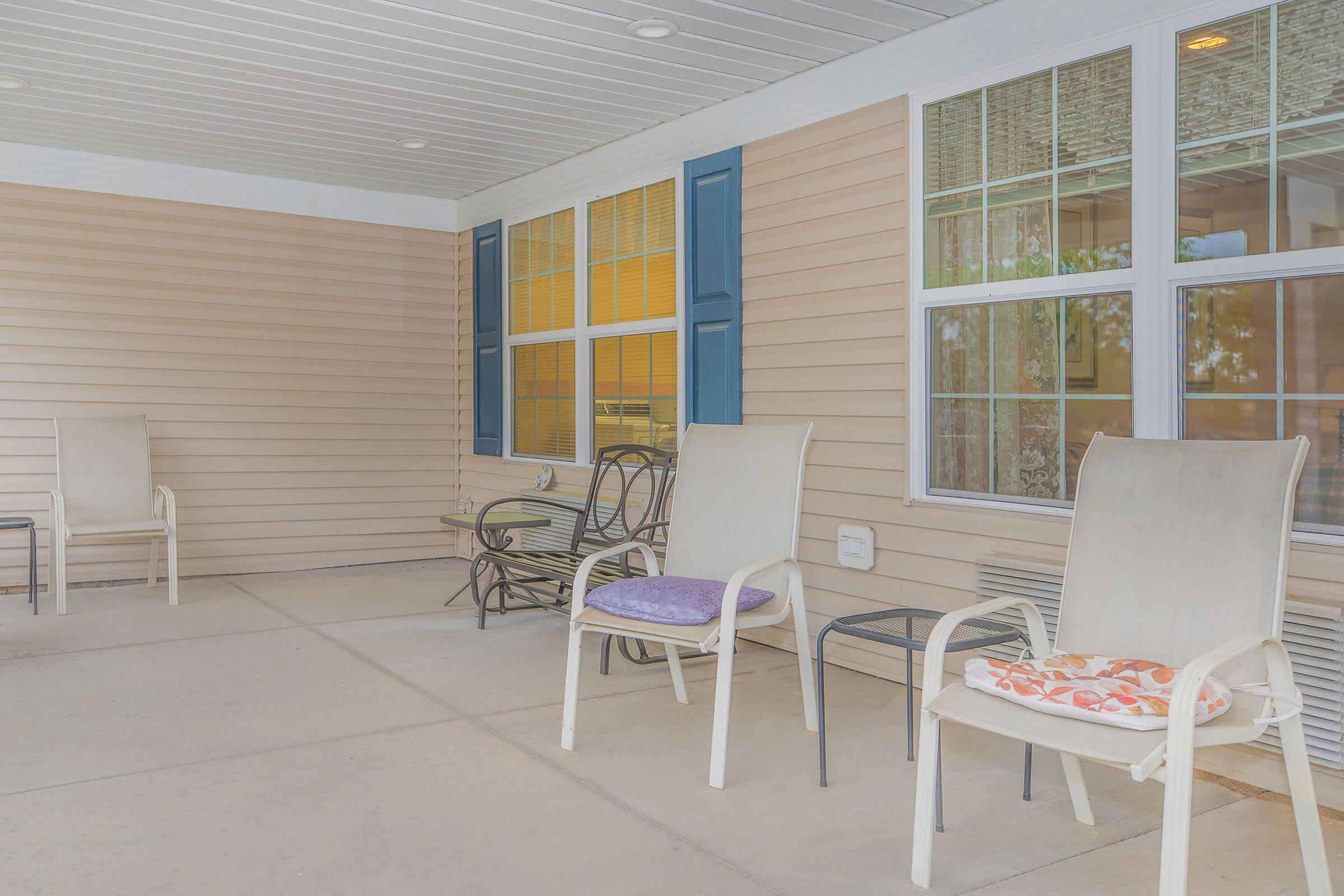 a dining room table in front of a building