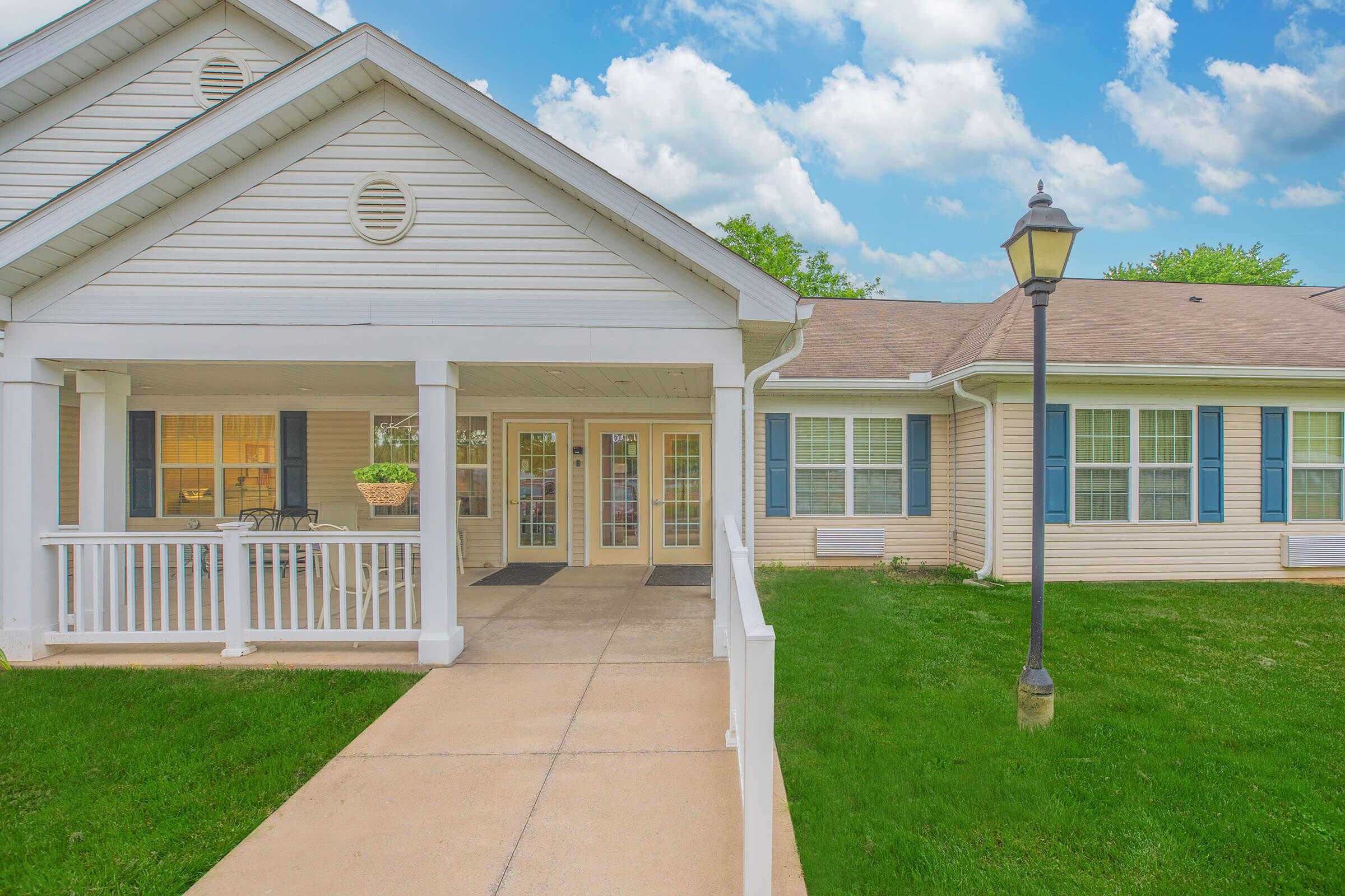 a large lawn in front of a house