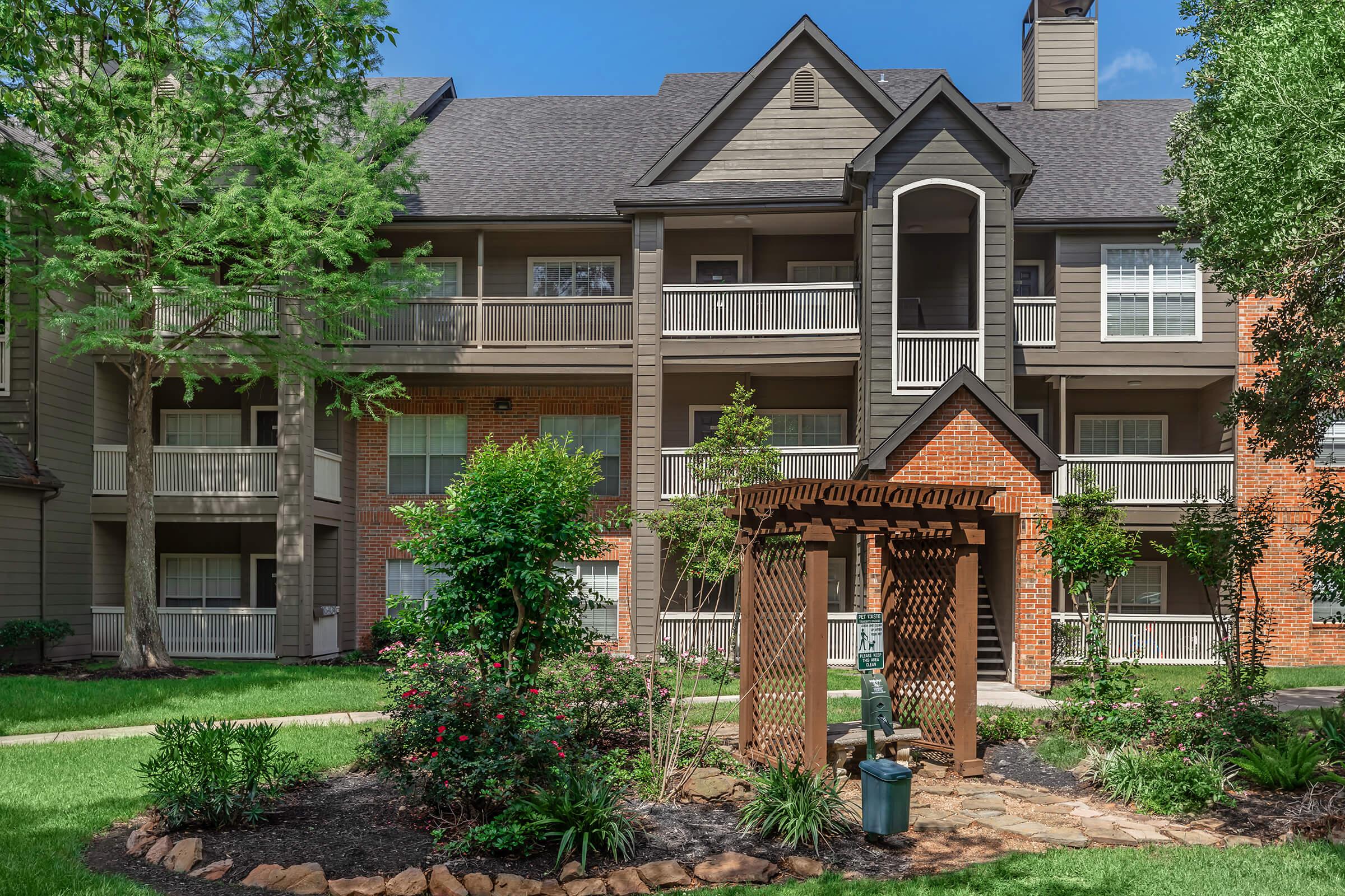 community courtyard with a wooden arbor