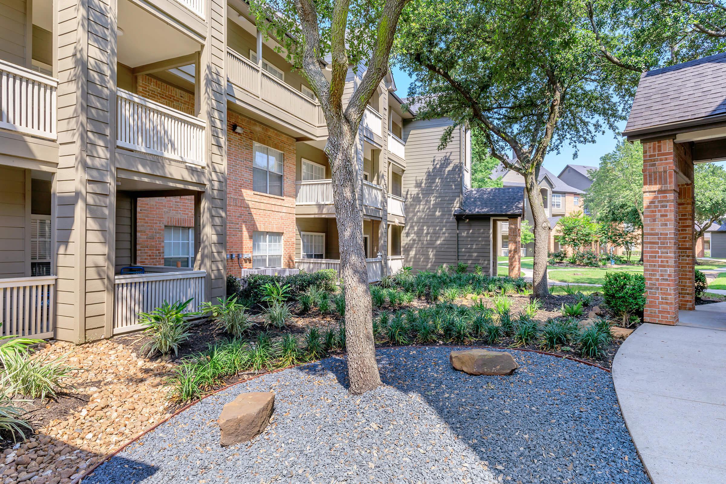 a stone path in front of a building