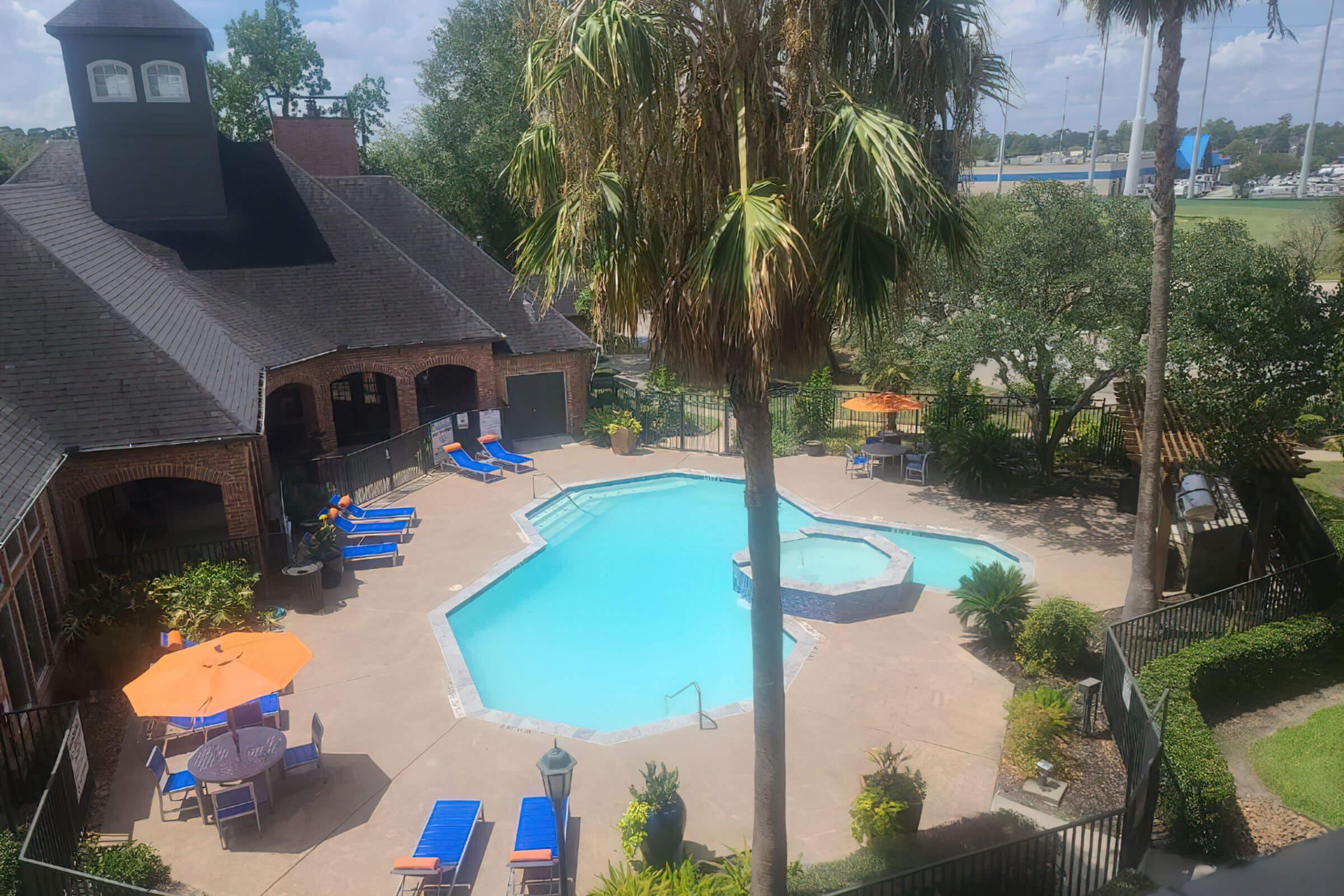 the community pool and spa from the second floor