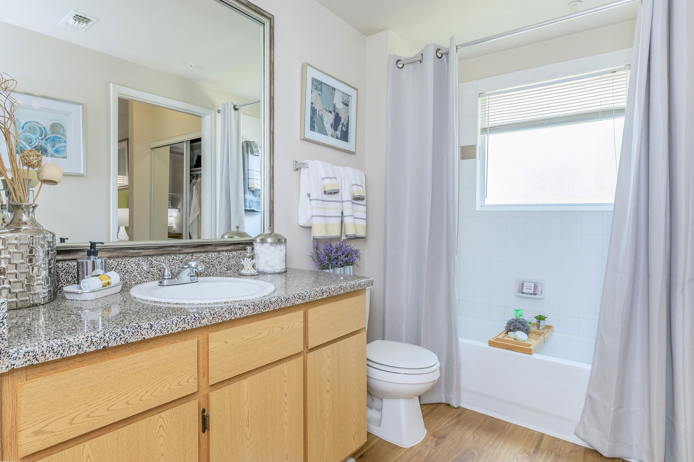 a kitchen with a sink and a window