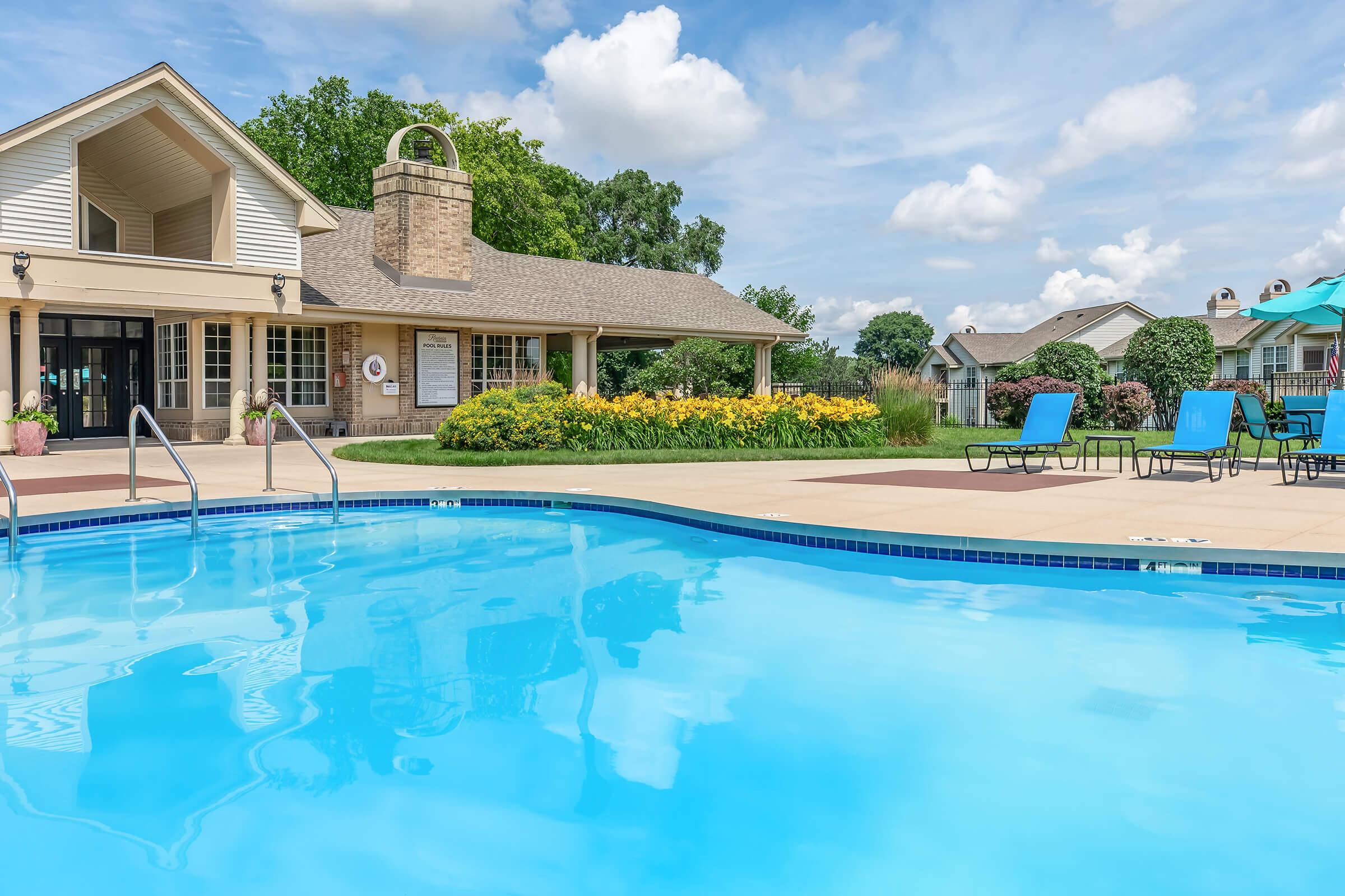 a house with a large pool of water