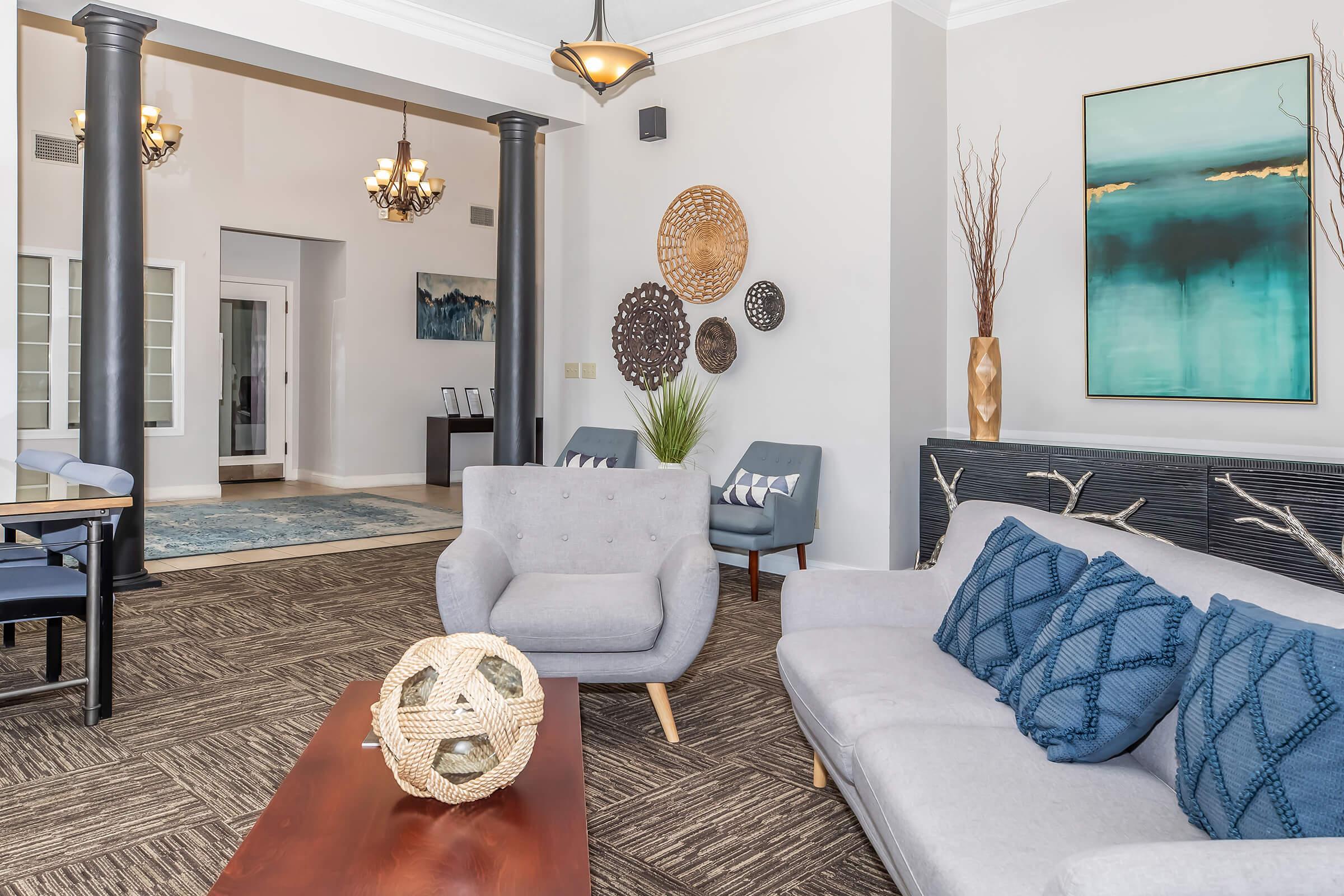 a living room filled with furniture and a fireplace