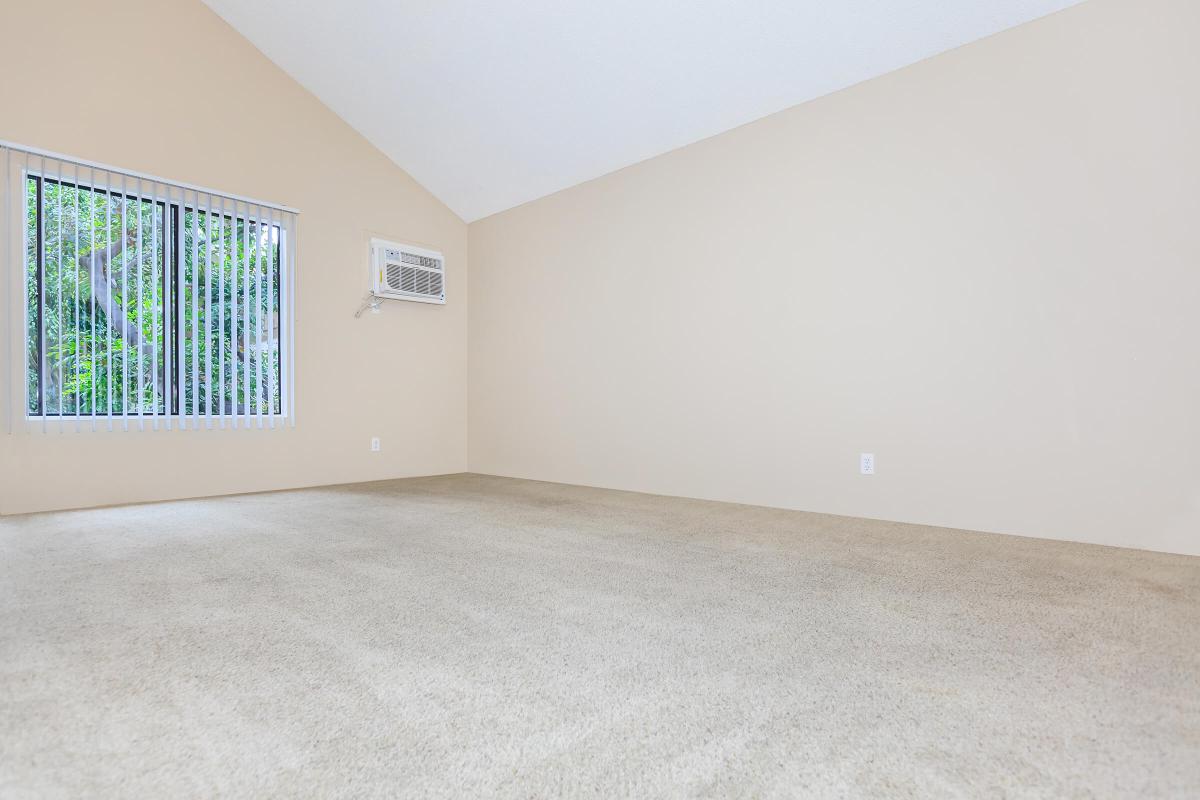 Vacant living room with AC unit