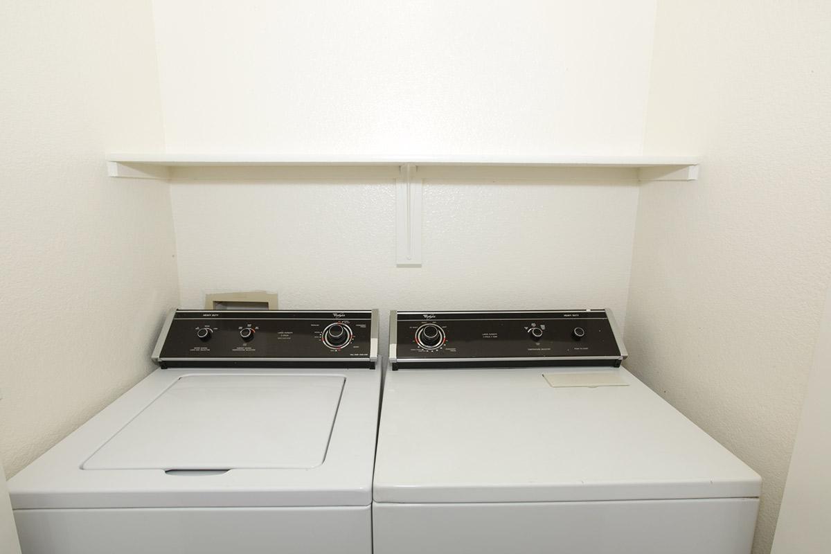 a white microwave oven sitting on top of a stove