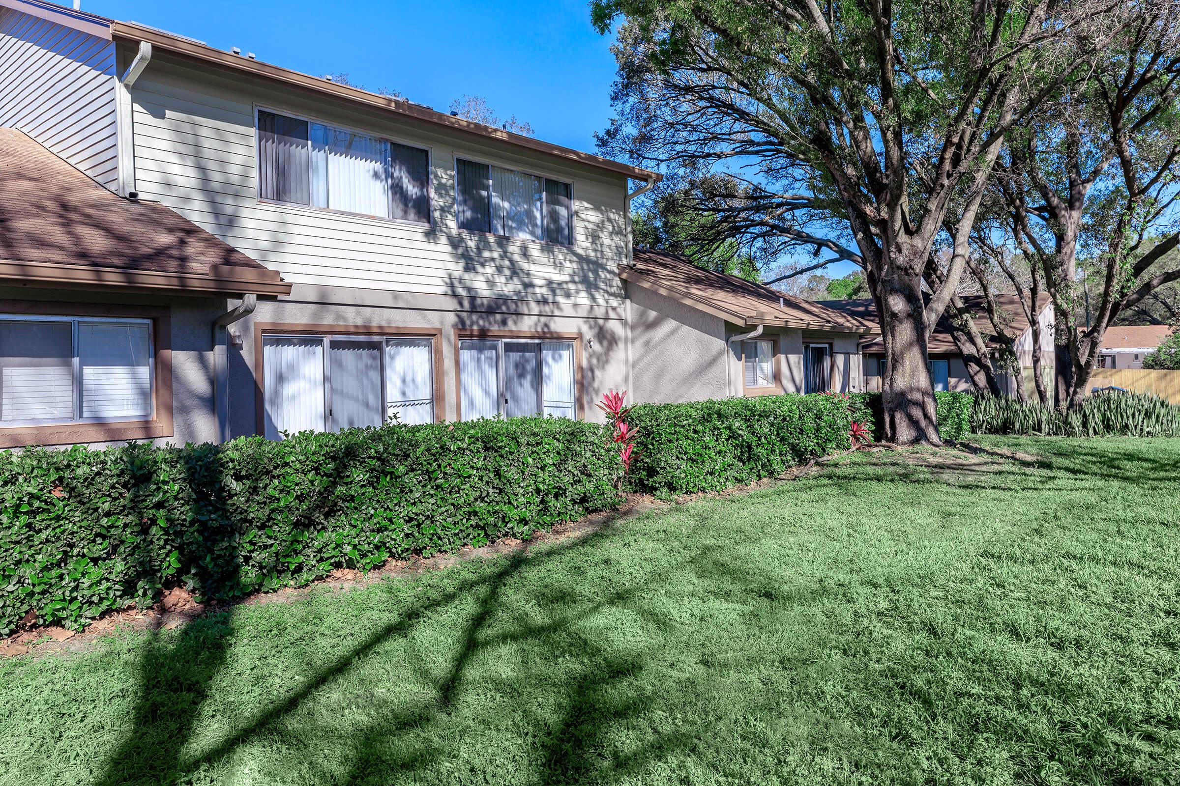 a large lawn in front of a house