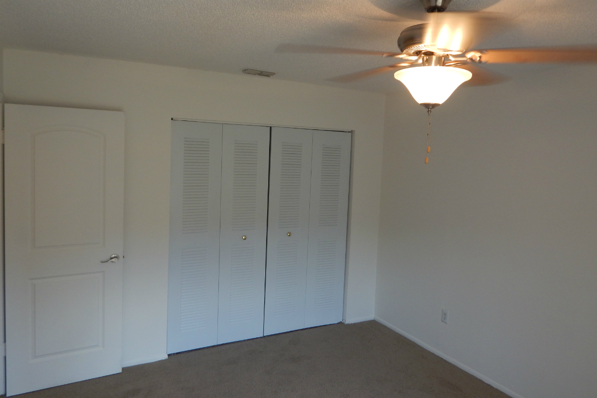 a large white refrigerator in a room