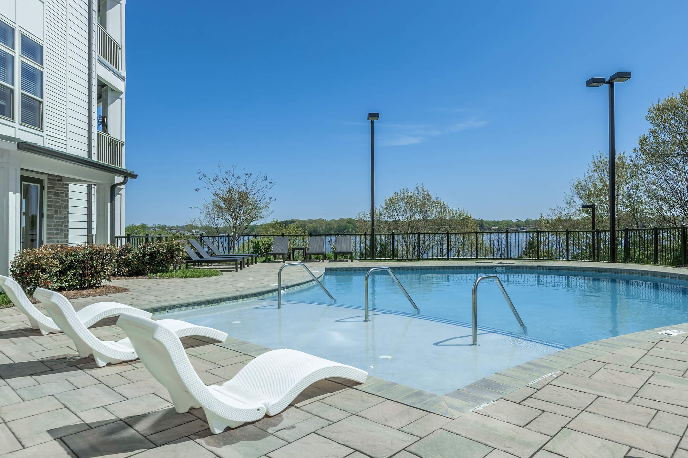 Lounge at the sparkling swimming pool 