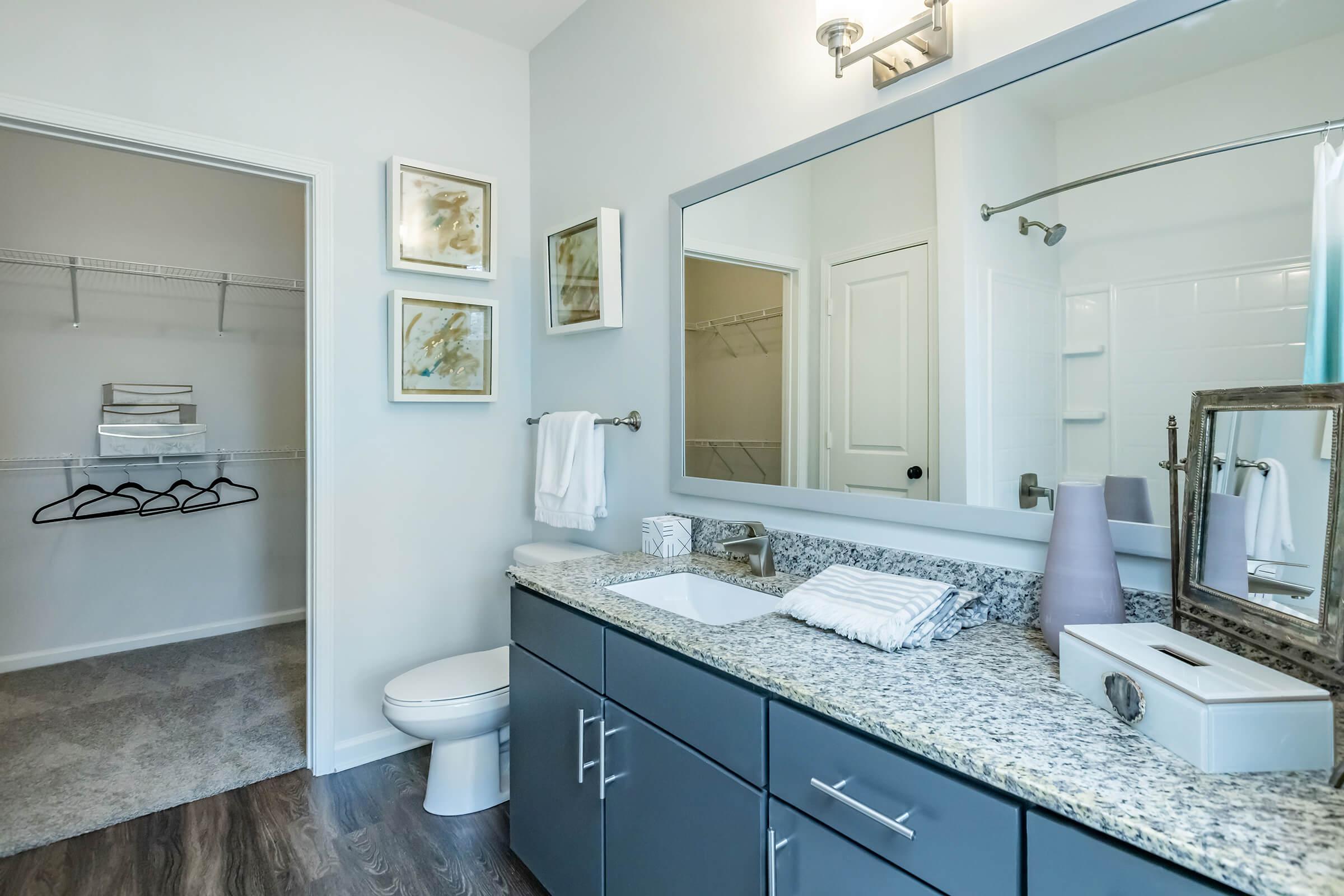 Granite countertops in spacious bathroom