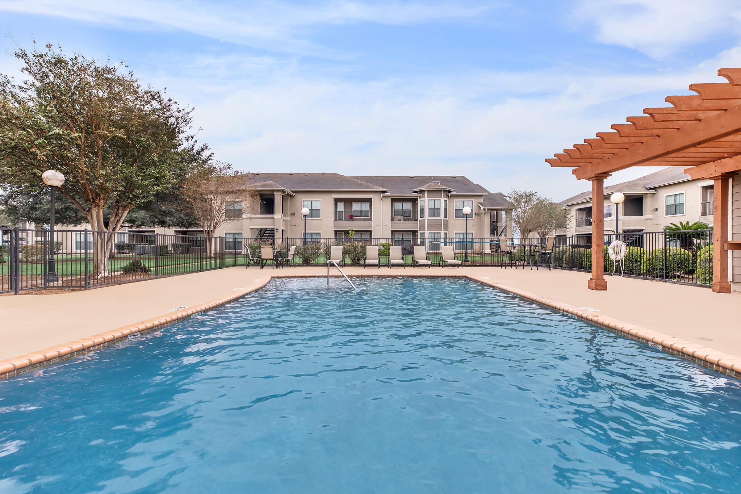 a house with a large pool of water