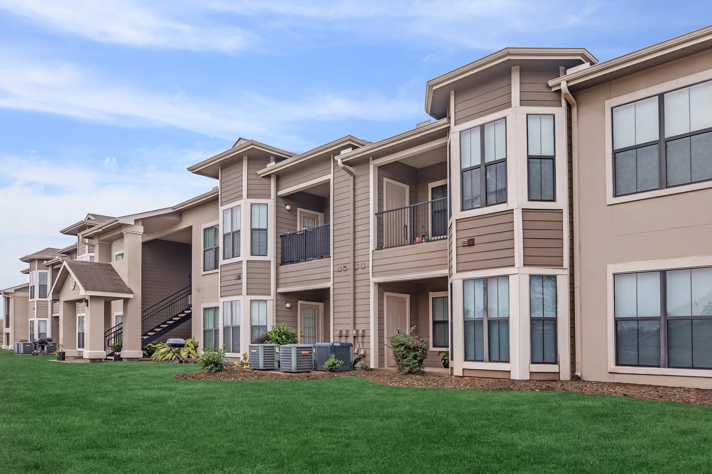 a large lawn in front of a house