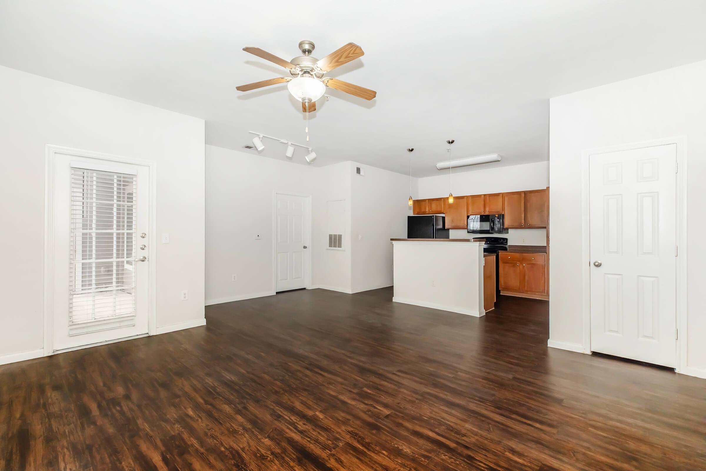 a kitchen with a wood floor