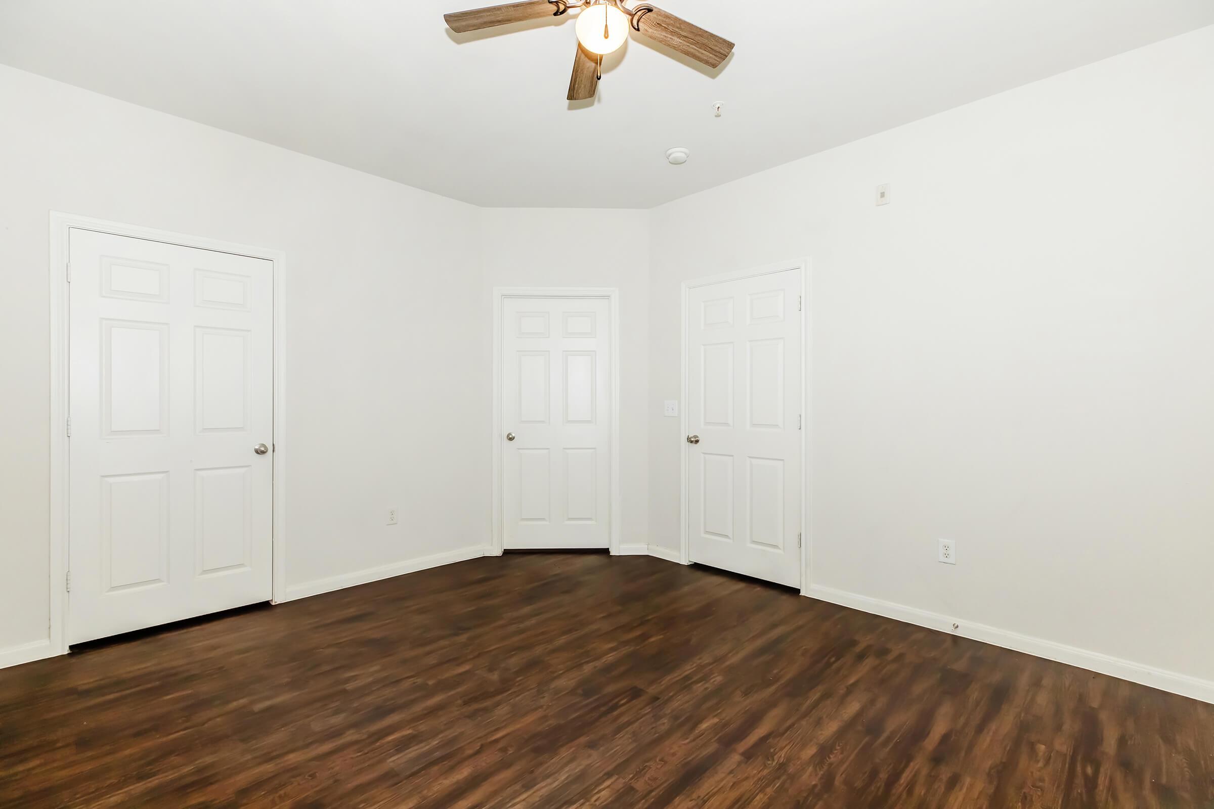 a kitchen with a wood floor