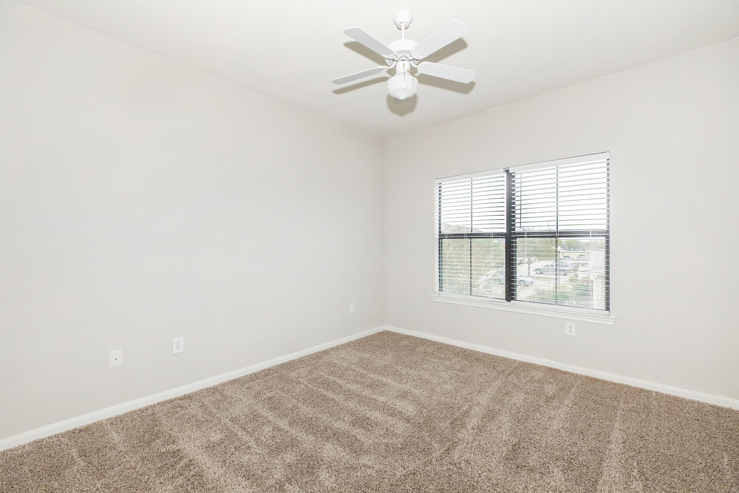 a room with a sink and a window