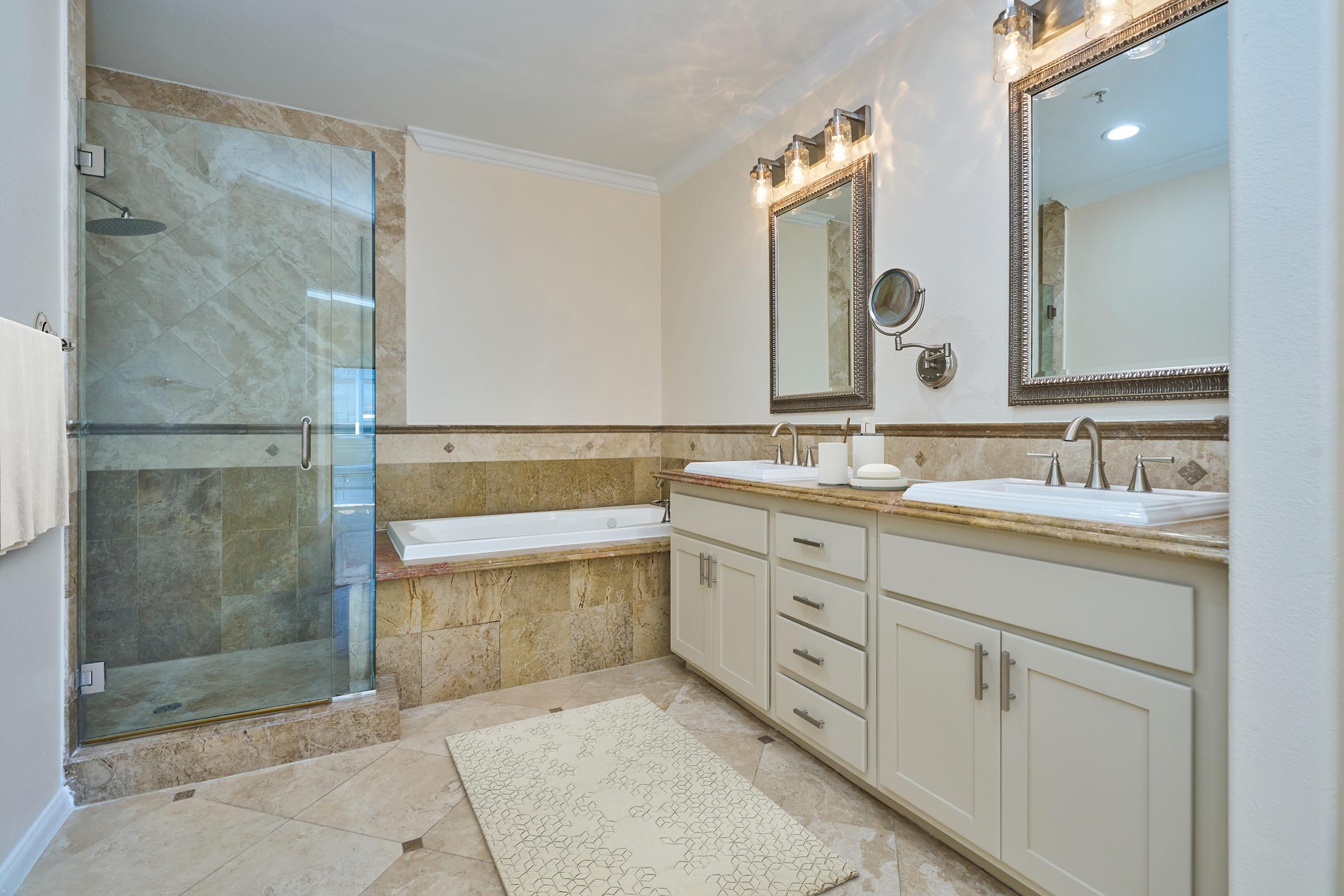 a kitchen with a sink and a mirror