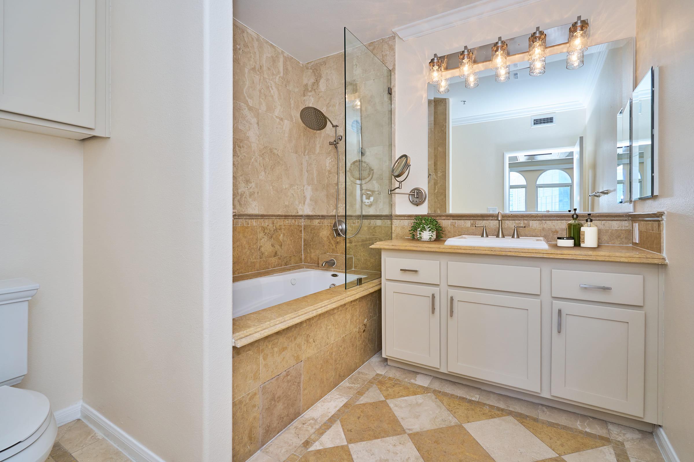 a kitchen with a sink and a mirror