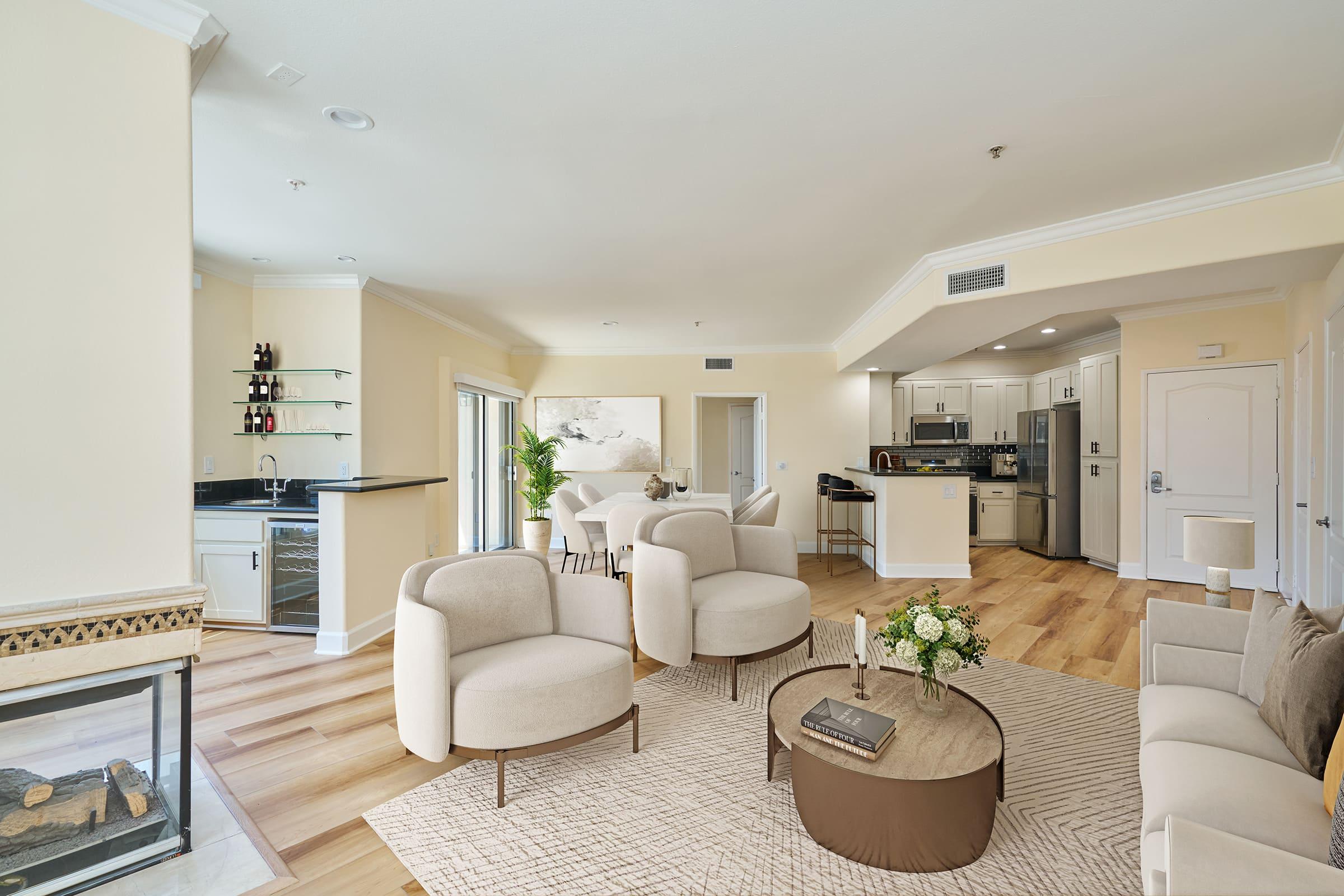 a living room filled with furniture and a fireplace