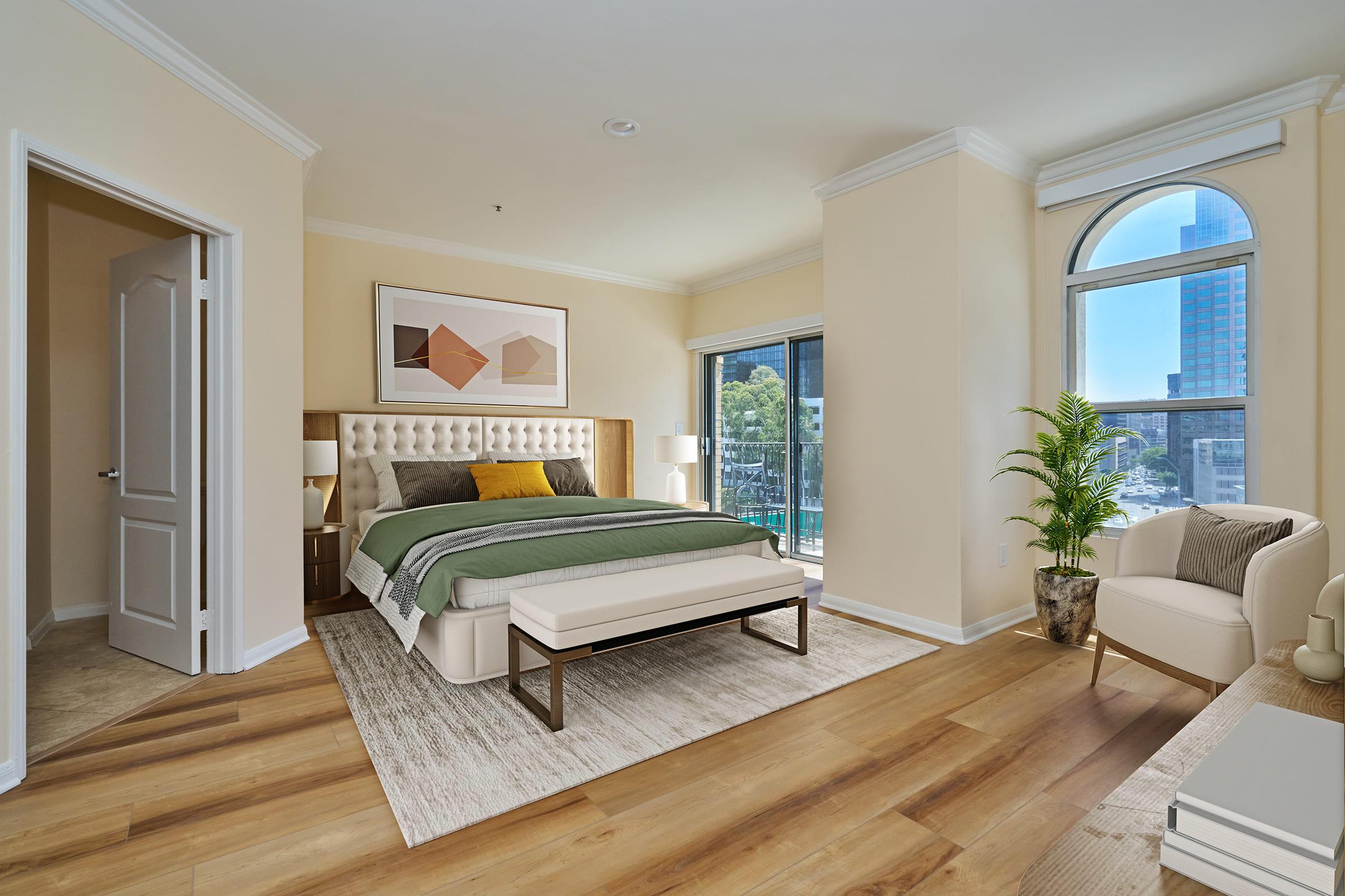 a living room filled with furniture and a large window