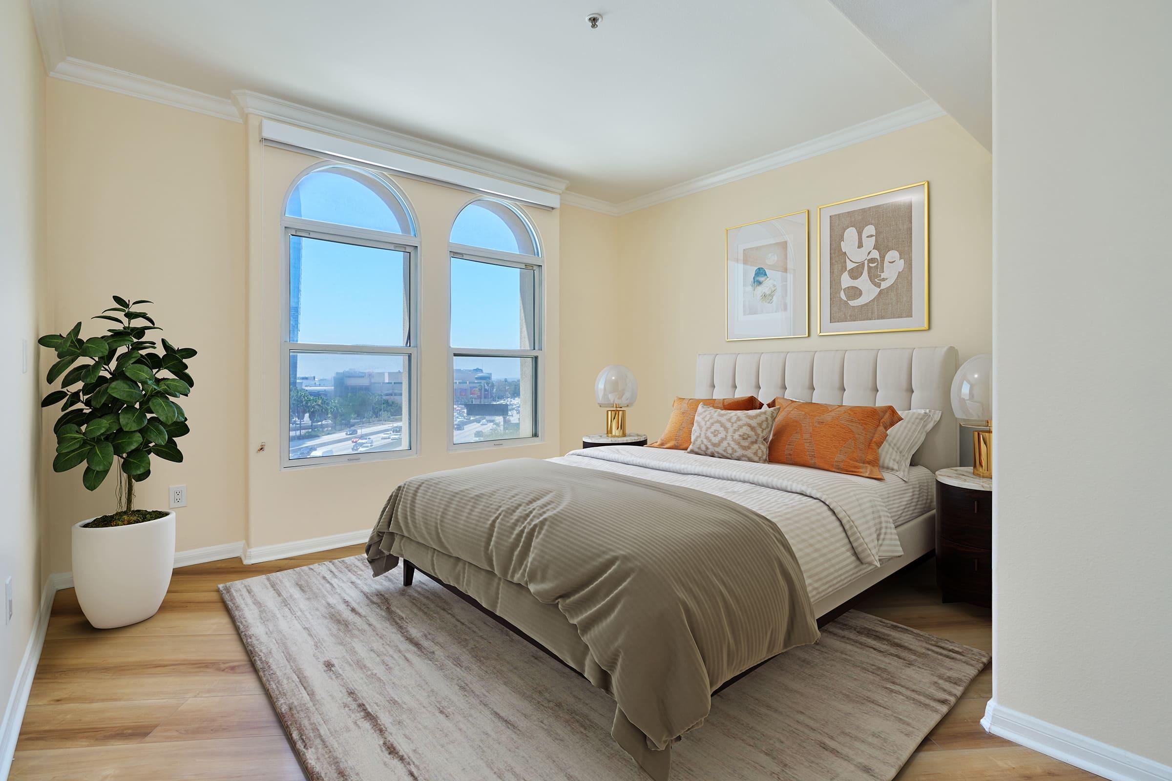 a bedroom with a large bed in a room