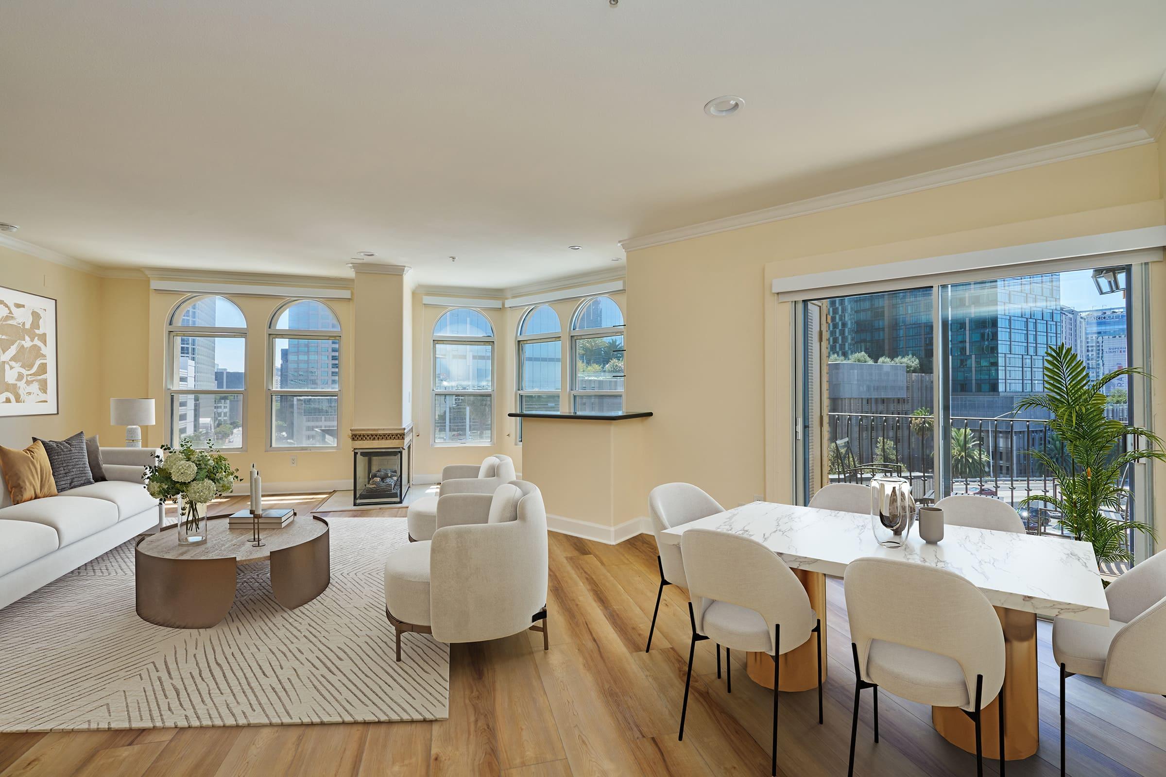 a living room filled with furniture and a large window