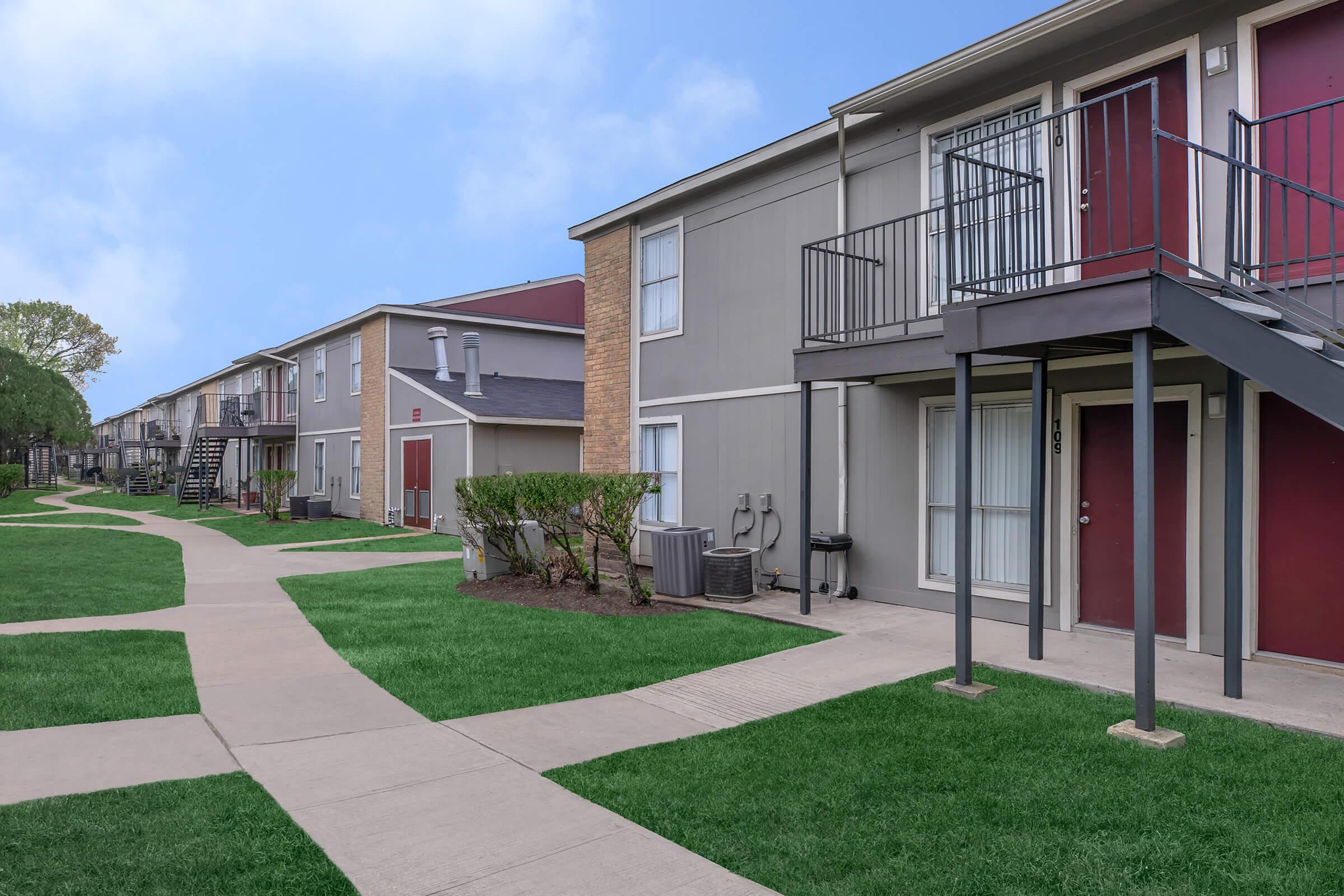 a large lawn in front of a house