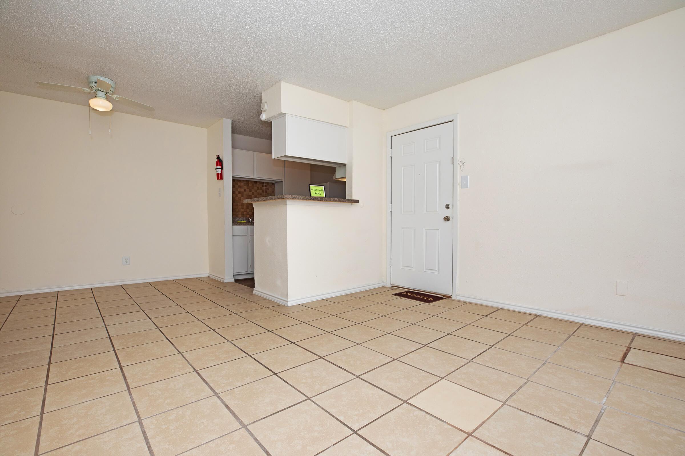 a large white refrigerator in a room