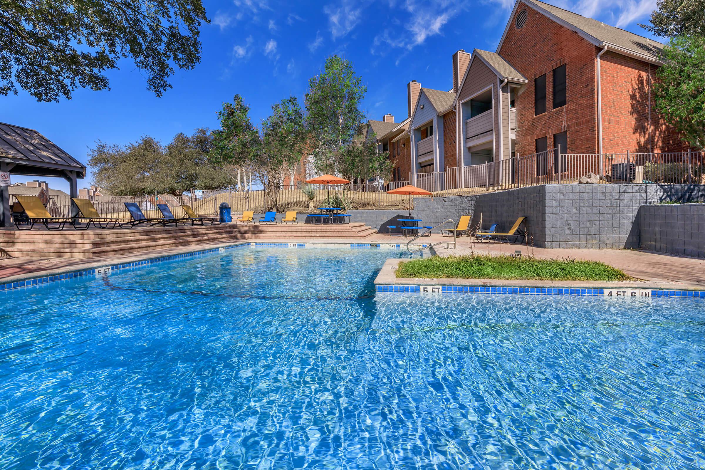 a pool next to a body of water