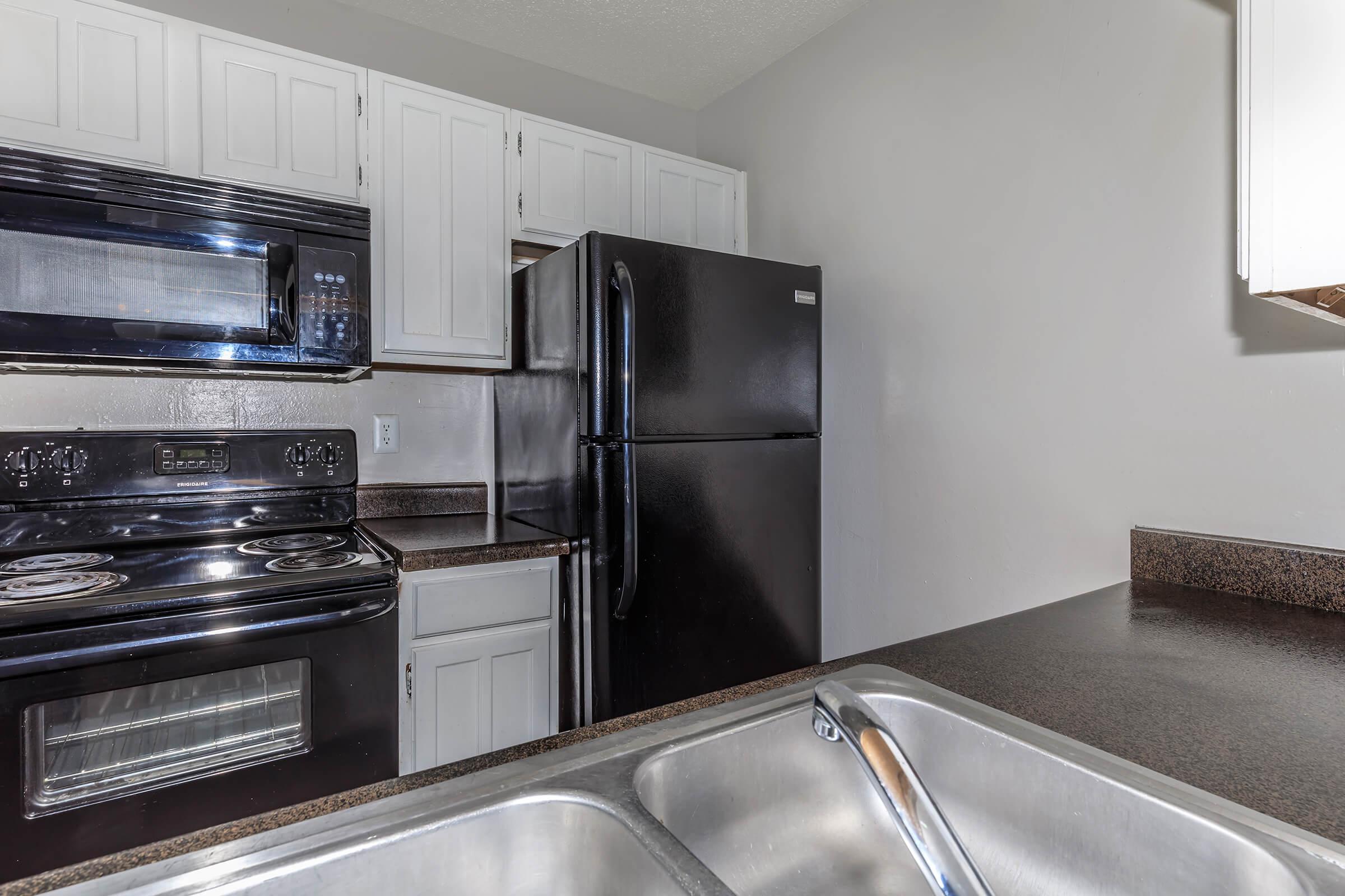 a kitchen with stainless steel appliances