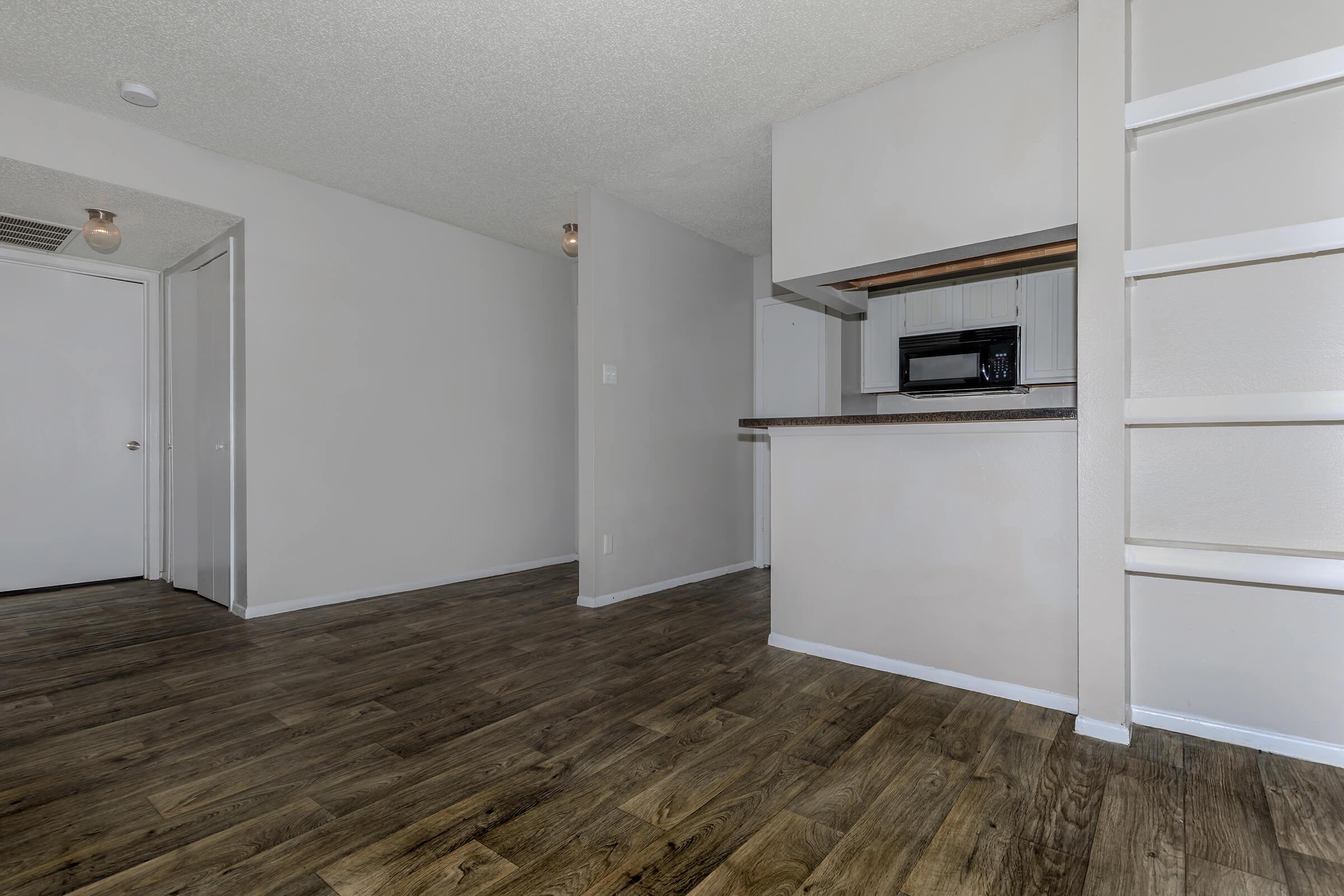 a large white refrigerator in a kitchen