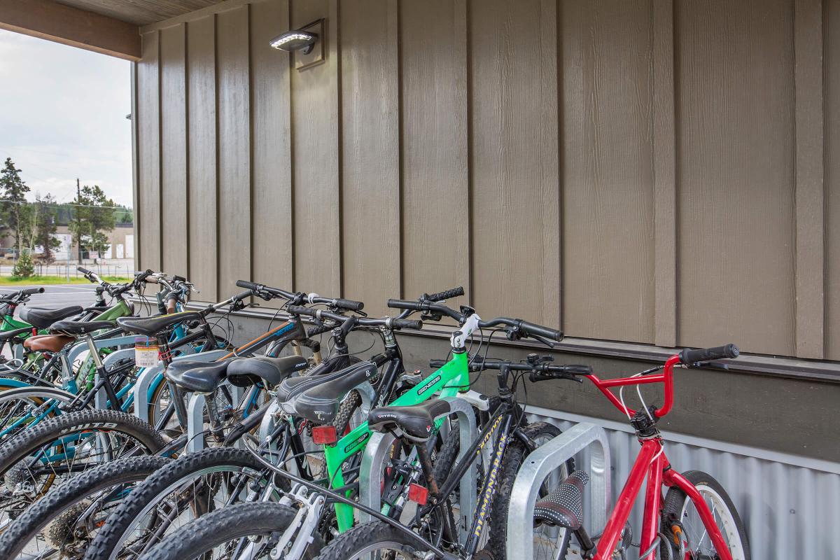 a bicycle parked on the side of a building