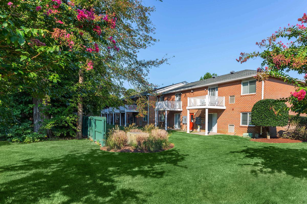 a large lawn in front of a house