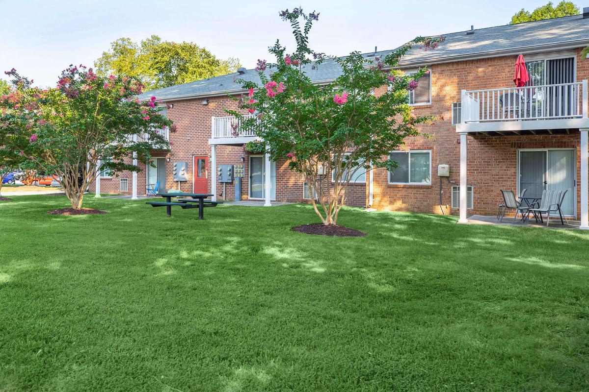 a large lawn in front of a house