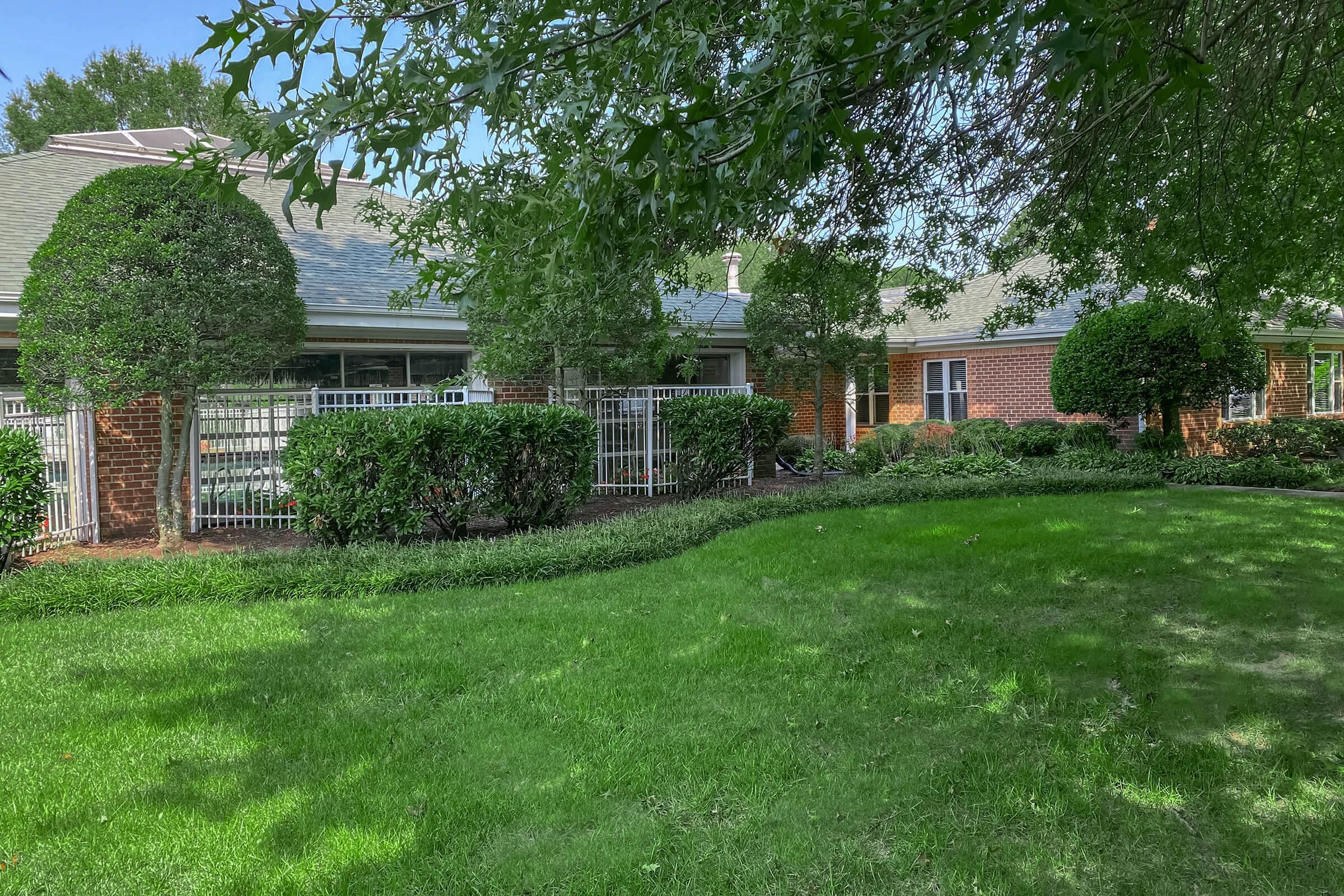 a large lawn in front of a house