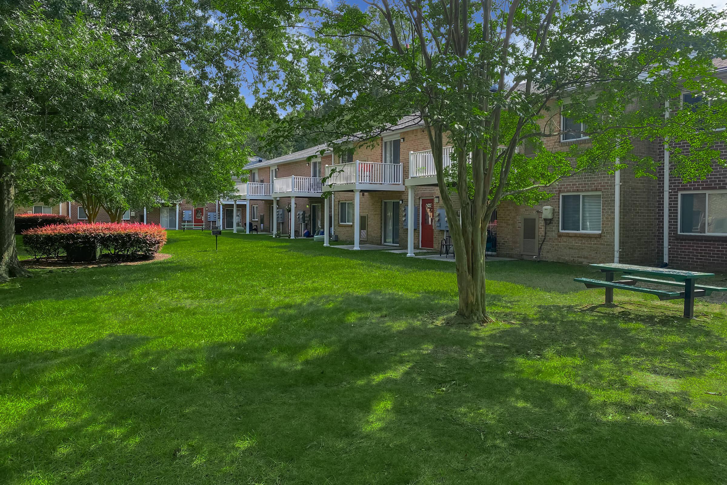 a large lawn in front of a house