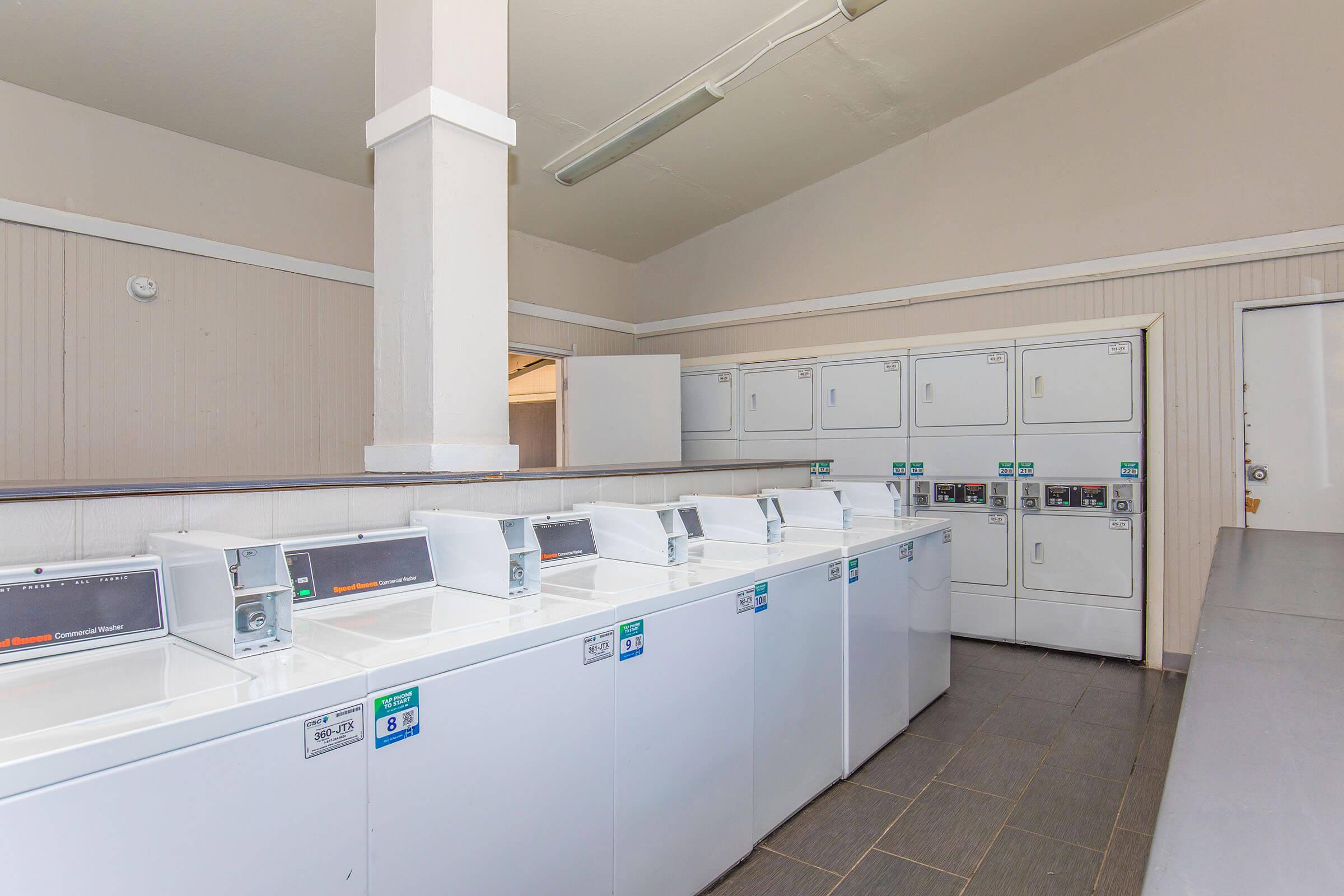 a kitchen with a stove and a refrigerator